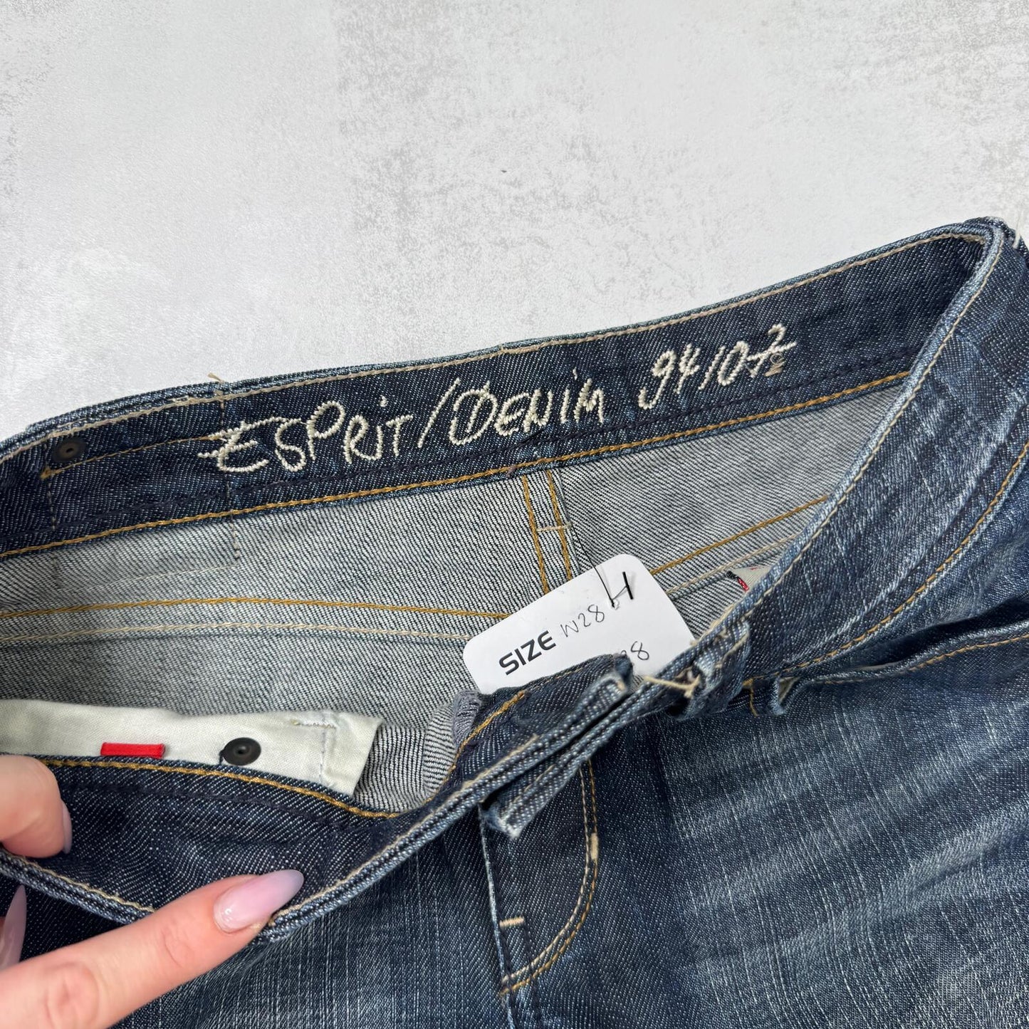 Y2K vintage bootcut denim jeans dark blue wash faded stretch mid rise