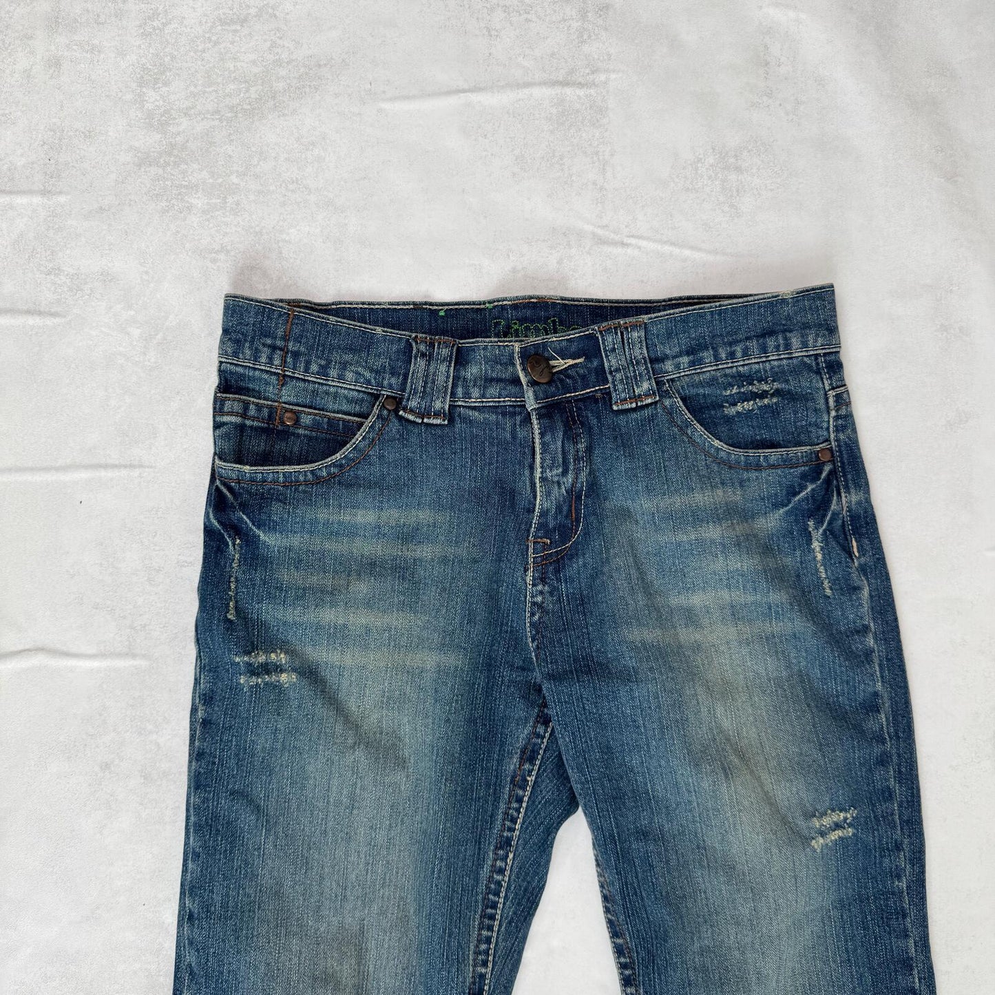 Y2K vintage bootcut denim jeans mid rise faded dirty wash distressed blue