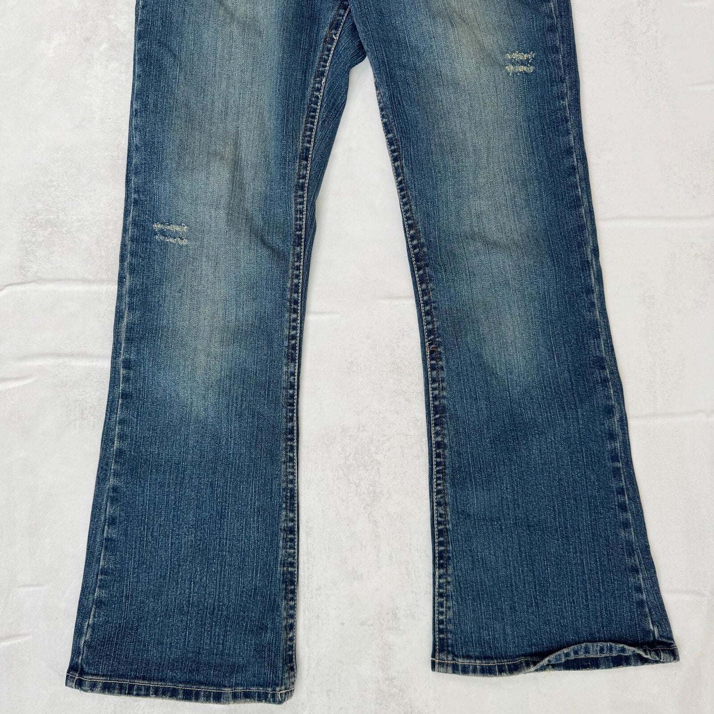 Y2K vintage bootcut denim jeans mid rise faded dirty wash distressed blue