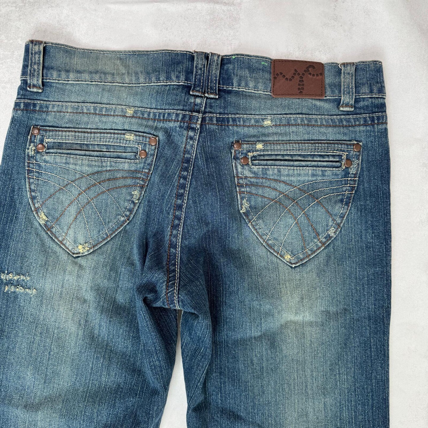 Y2K vintage bootcut denim jeans mid rise faded dirty wash distressed blue