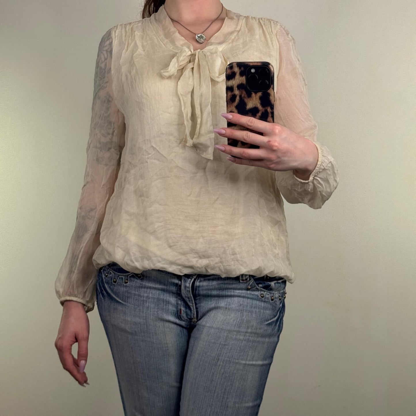 Y2K vintage silk blouse bow sheer long sleeve peplum bubble hem cuff cream shirt
