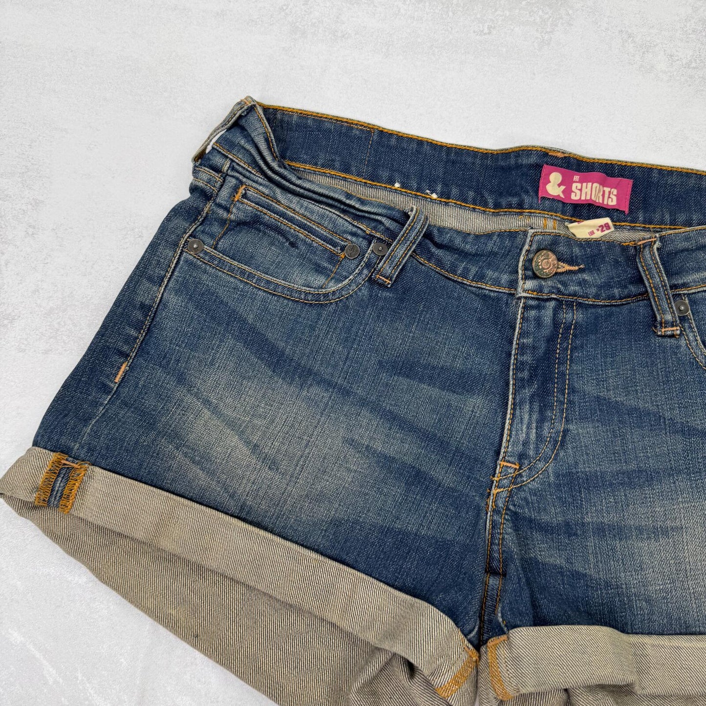 Y2K vintage low rise denim mini shorts faded dirty blue wash stretchy cargo