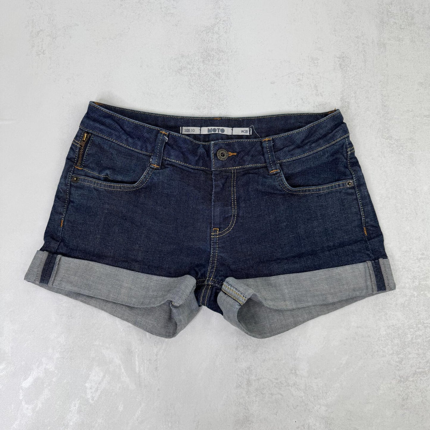 Y2K vintage denim mini shorts low rise stretchy dark blue wash turn up hem