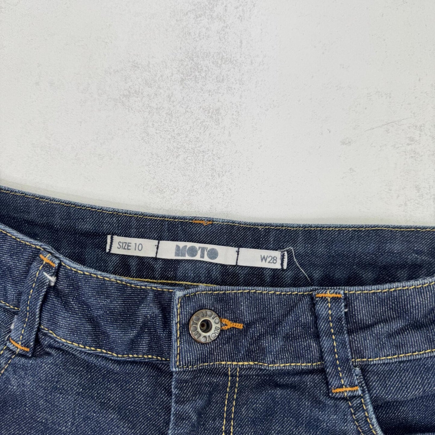 Y2K vintage denim mini shorts low rise stretchy dark blue wash turn up hem