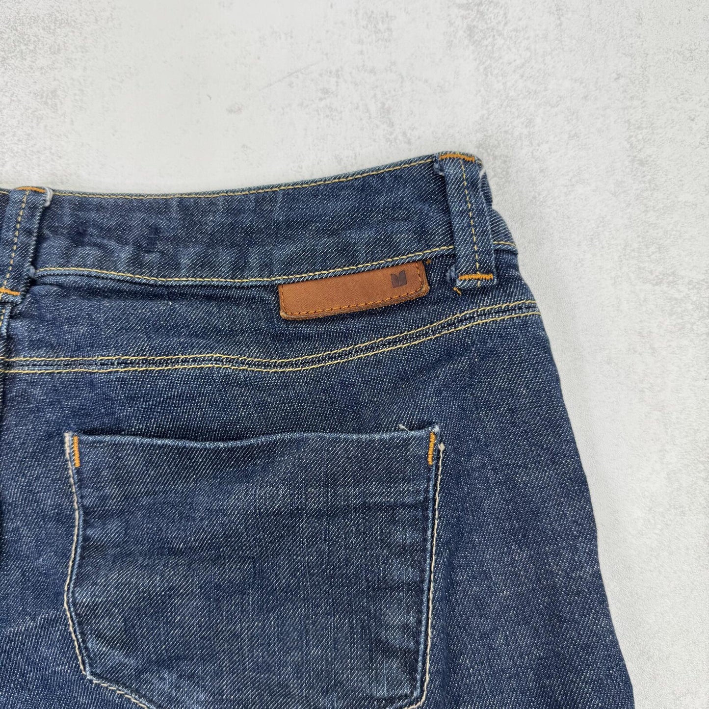 Y2K vintage denim mini shorts low rise stretchy dark blue wash turn up hem