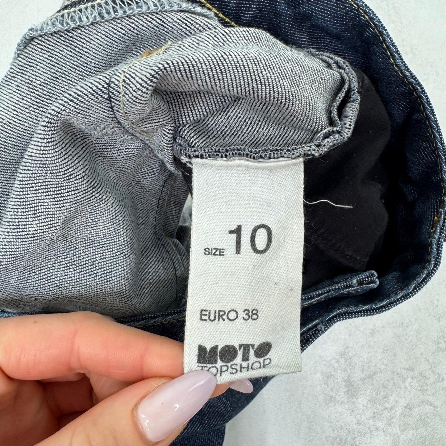 Y2K vintage denim mini shorts low rise stretchy dark blue wash turn up hem