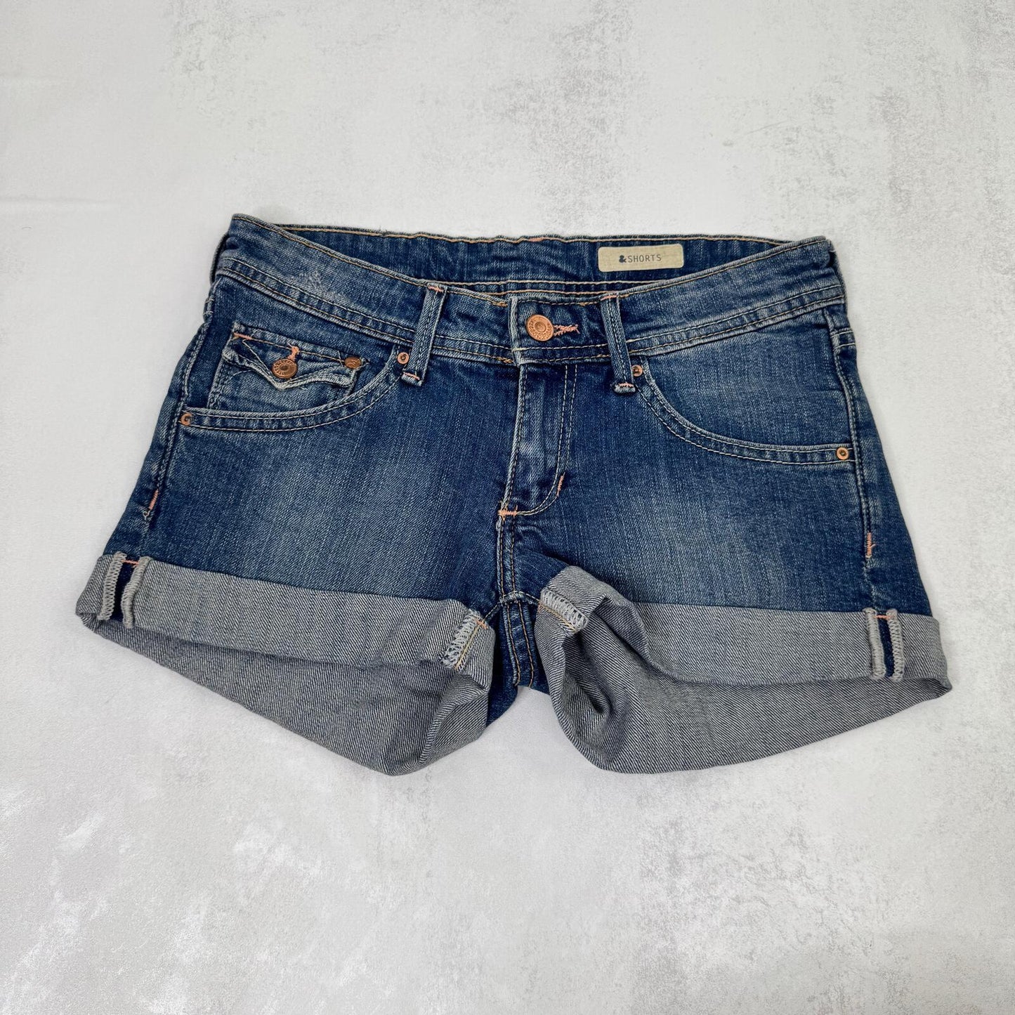 Y2K vintage low rise denim mini shorts cargo turn up hem faded blue stretchy