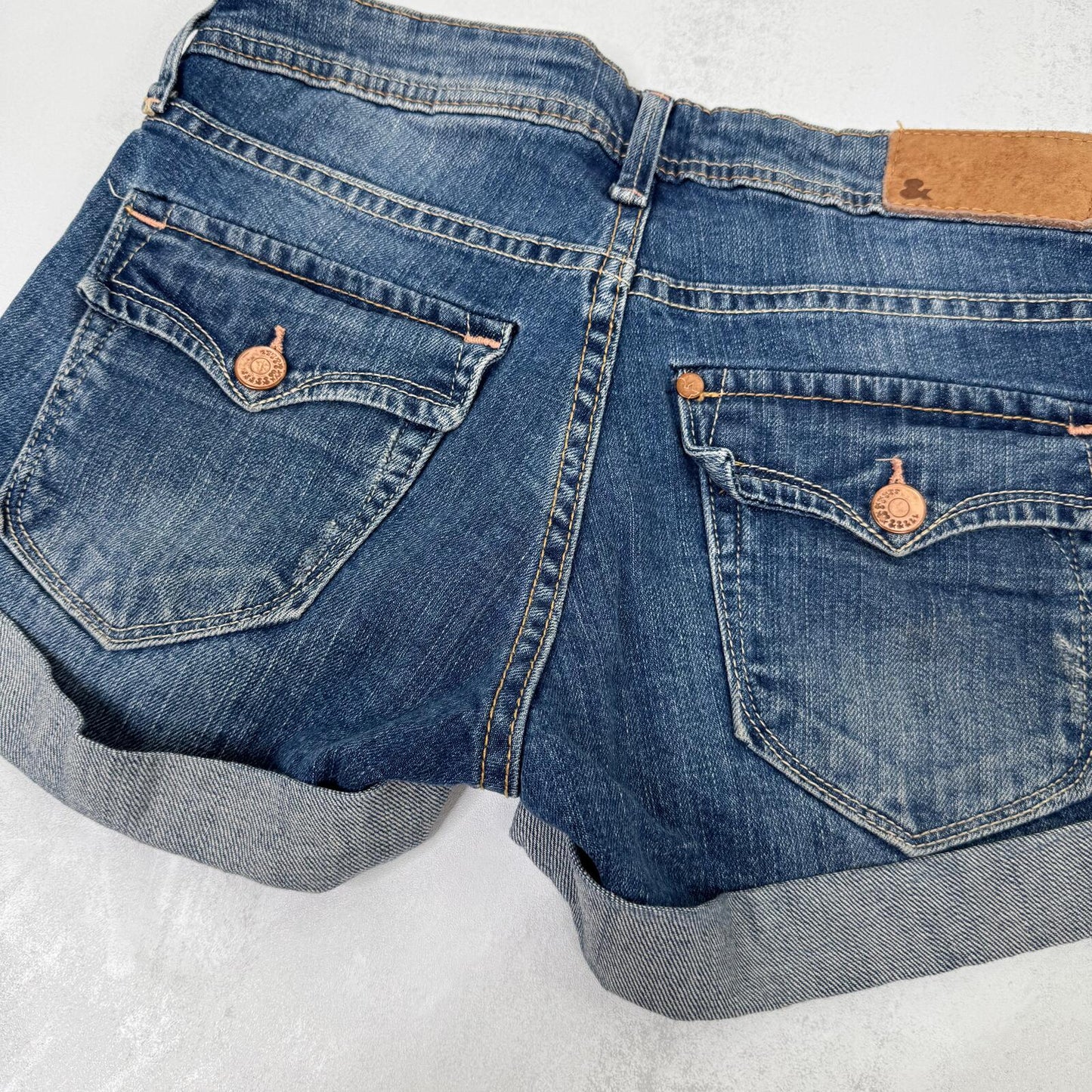 Y2K vintage low rise denim mini shorts cargo turn up hem faded blue stretchy