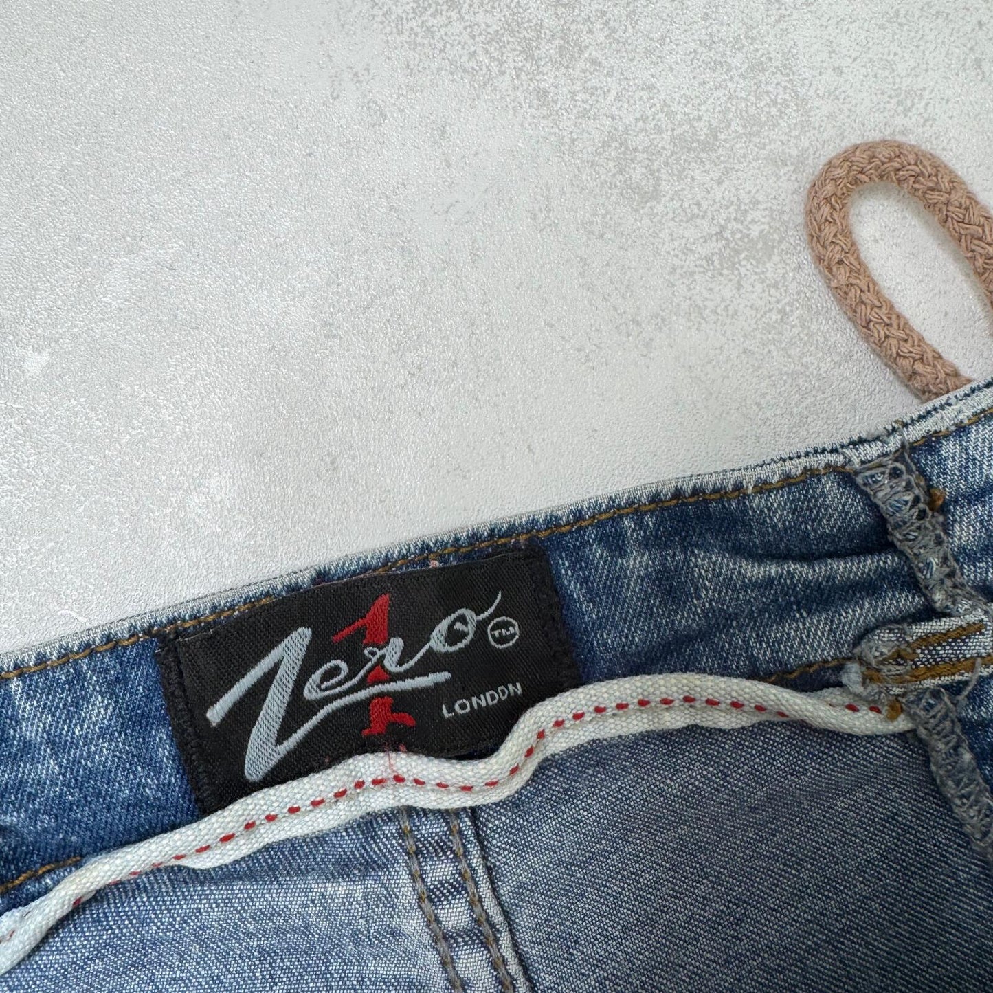 Y2K vintage bootcut denim jeans faded mid rise stretchy lace up mid blue wash