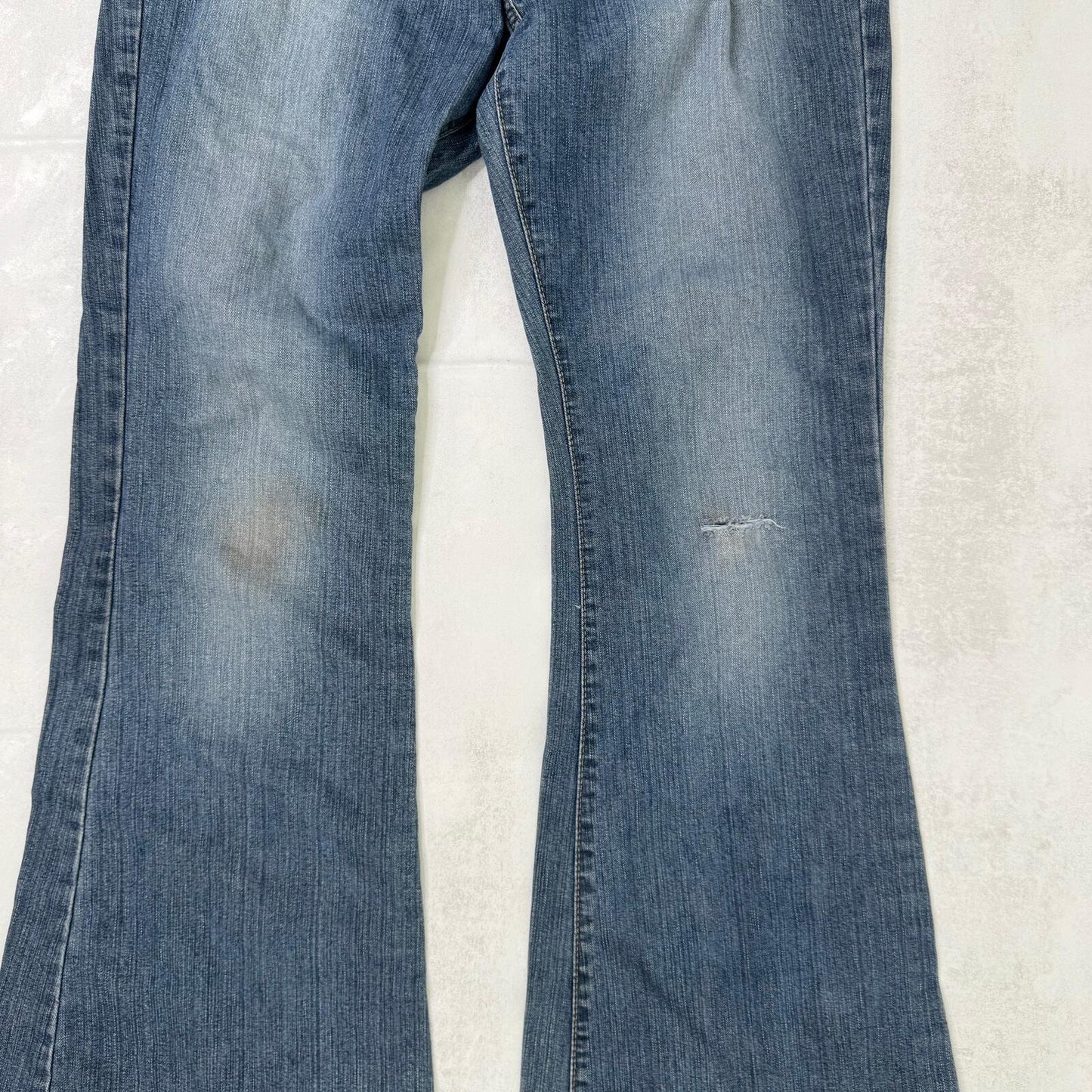 Y2K vintage bootcut denim jeans buckle belt faded blue wash ripped distressed