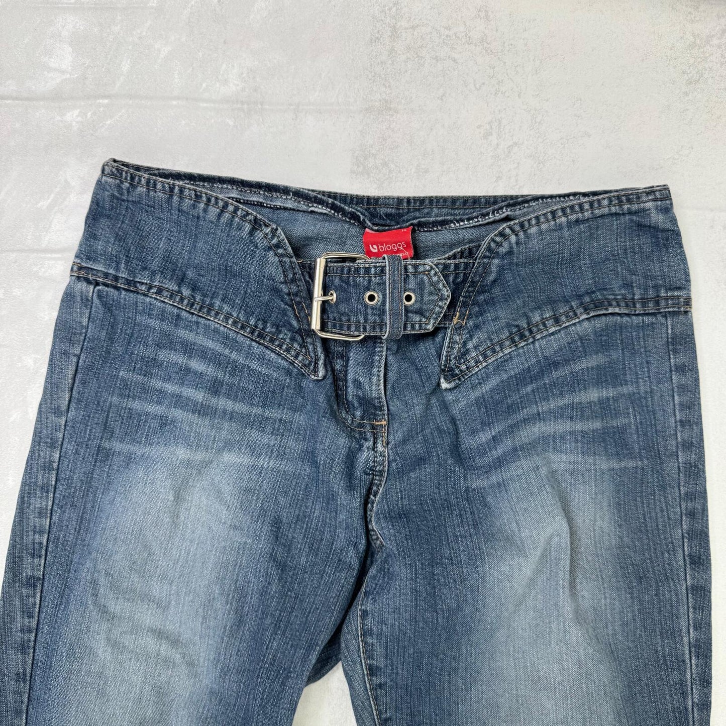 Y2K vintage bootcut denim jeans buckle belt faded blue wash ripped distressed