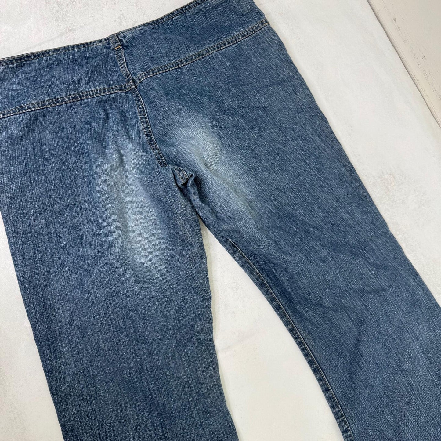 Y2K vintage bootcut denim jeans buckle belt faded blue wash ripped distressed