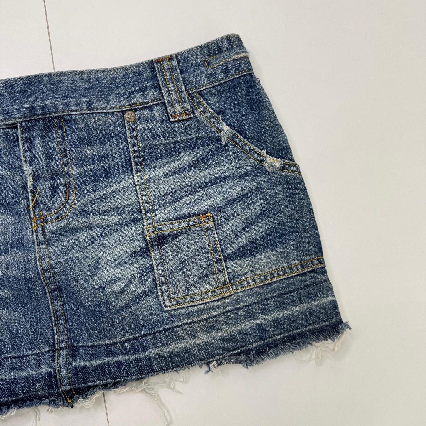 Y2K vintage low rise mini skirt micro faded blue denim wash fraying hem utility