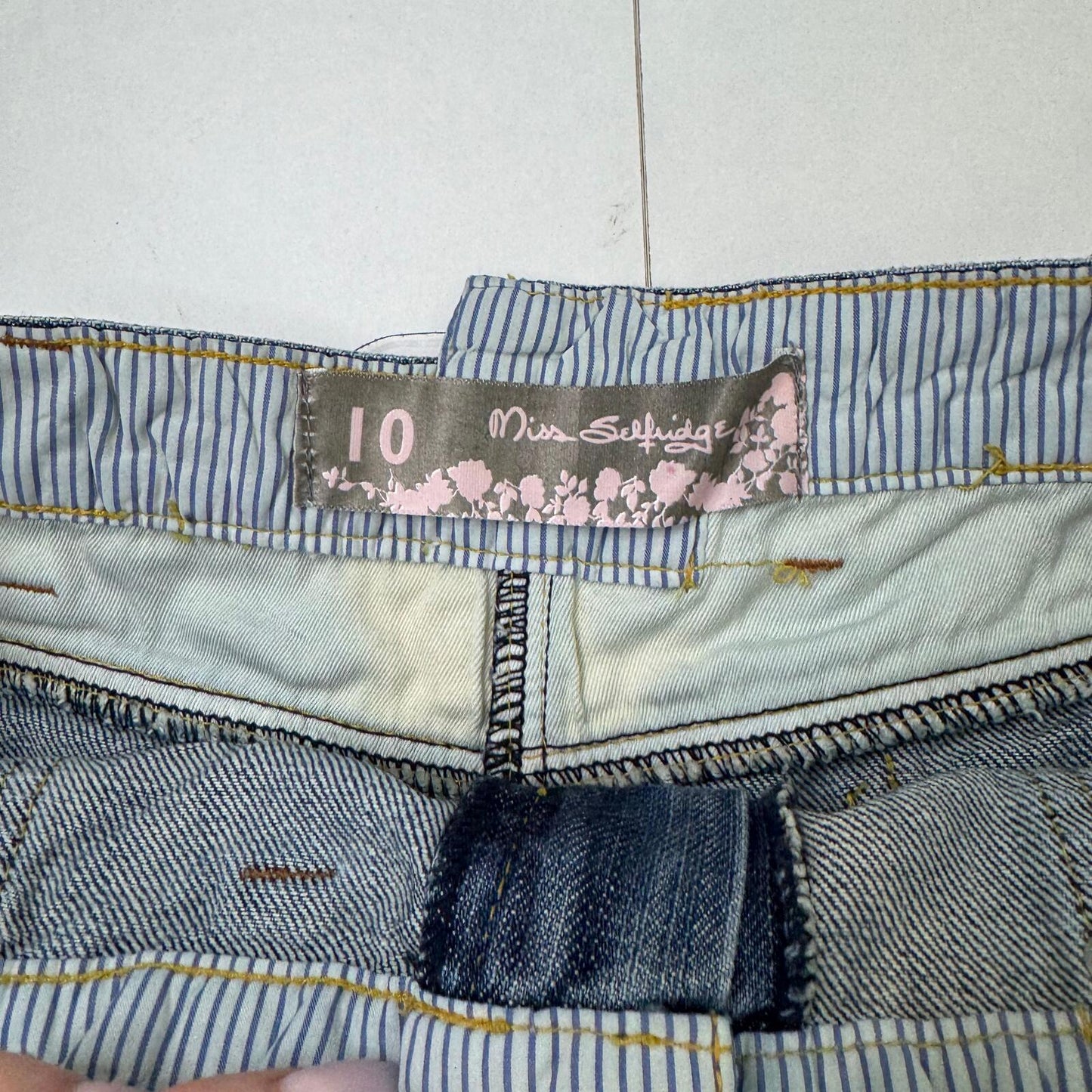 Y2K vintage low rise mini skirt micro faded blue denim wash fraying hem utility