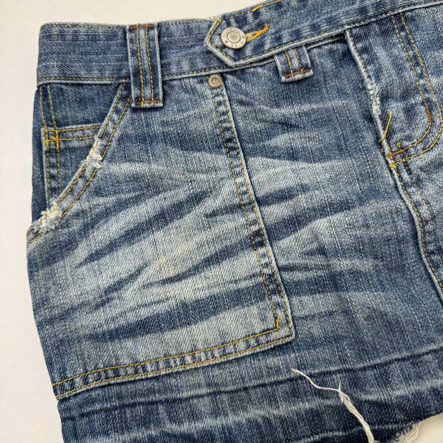 Y2K vintage low rise mini skirt micro faded blue denim wash fraying hem utility