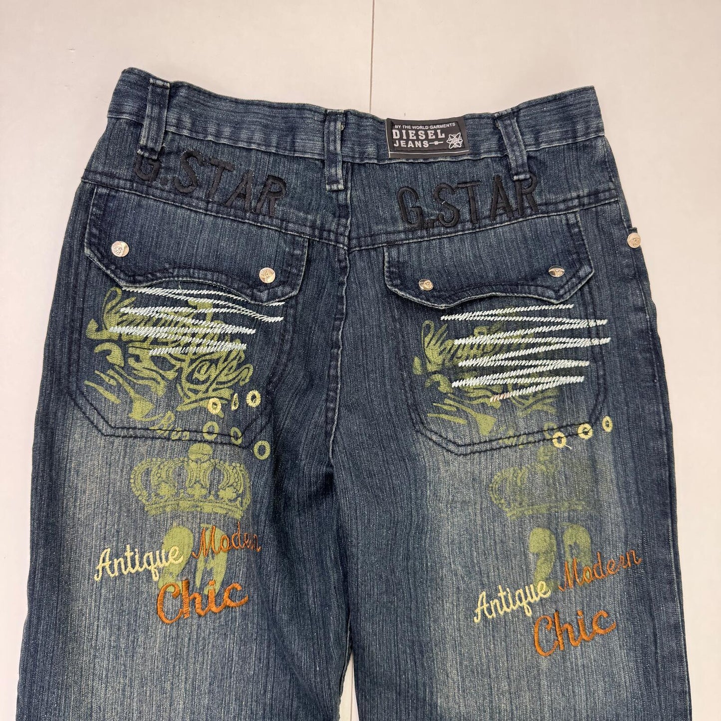 Y2K vintage baggy denim jeans embroidered crown cargo pockets faded blue wash