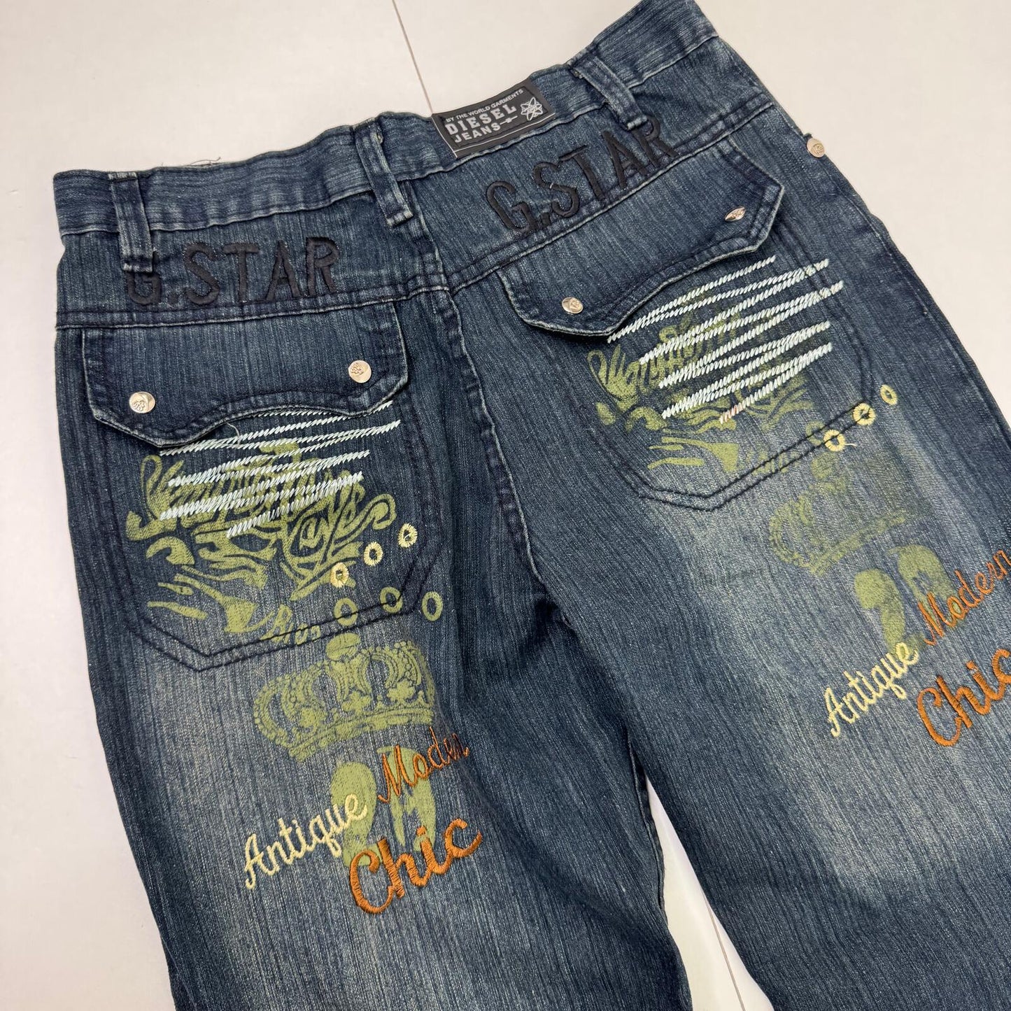 Y2K vintage baggy denim jeans embroidered crown cargo pockets faded blue wash
