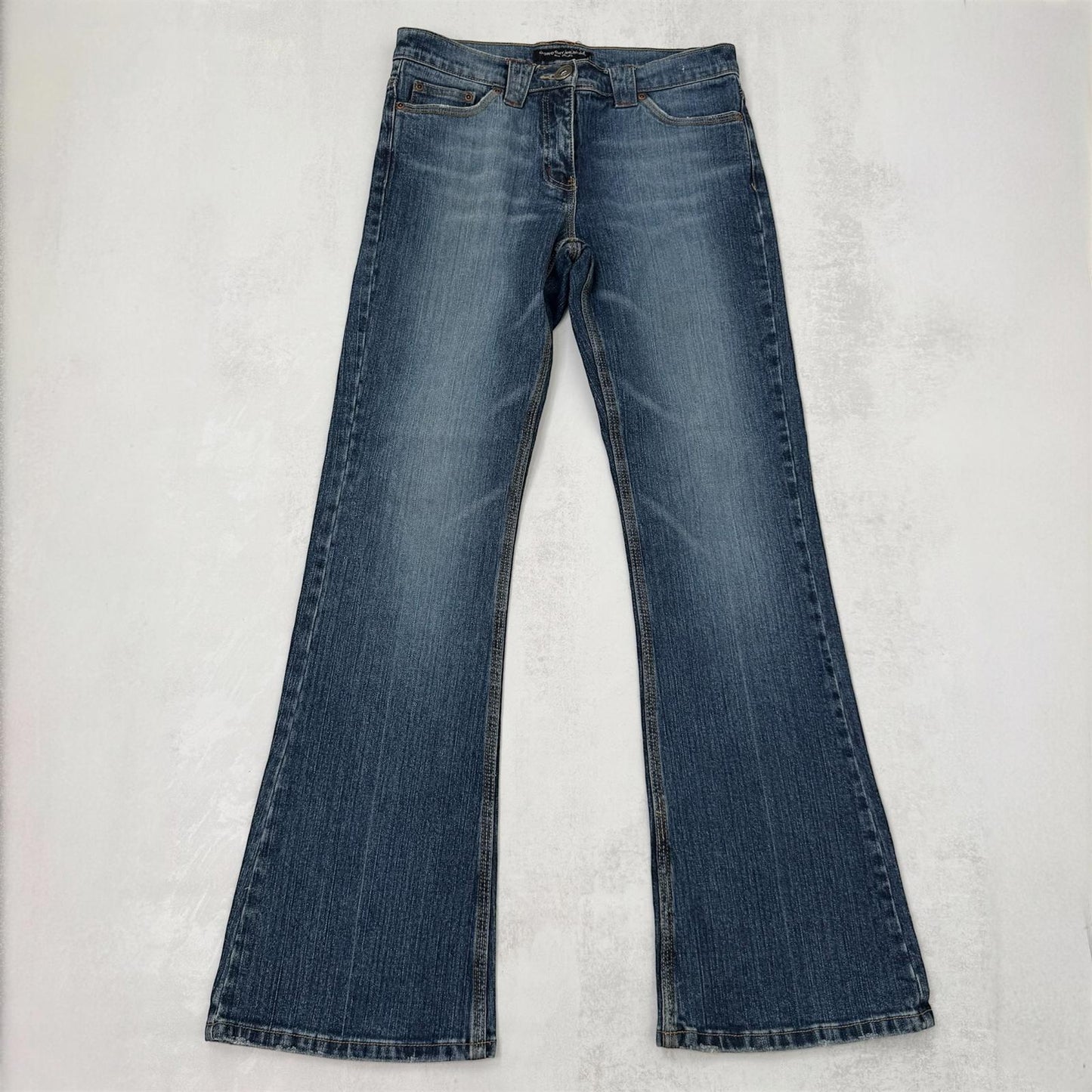 Y2K vintage bootcut denim jeans mid rise stretchy faded mid blue wash