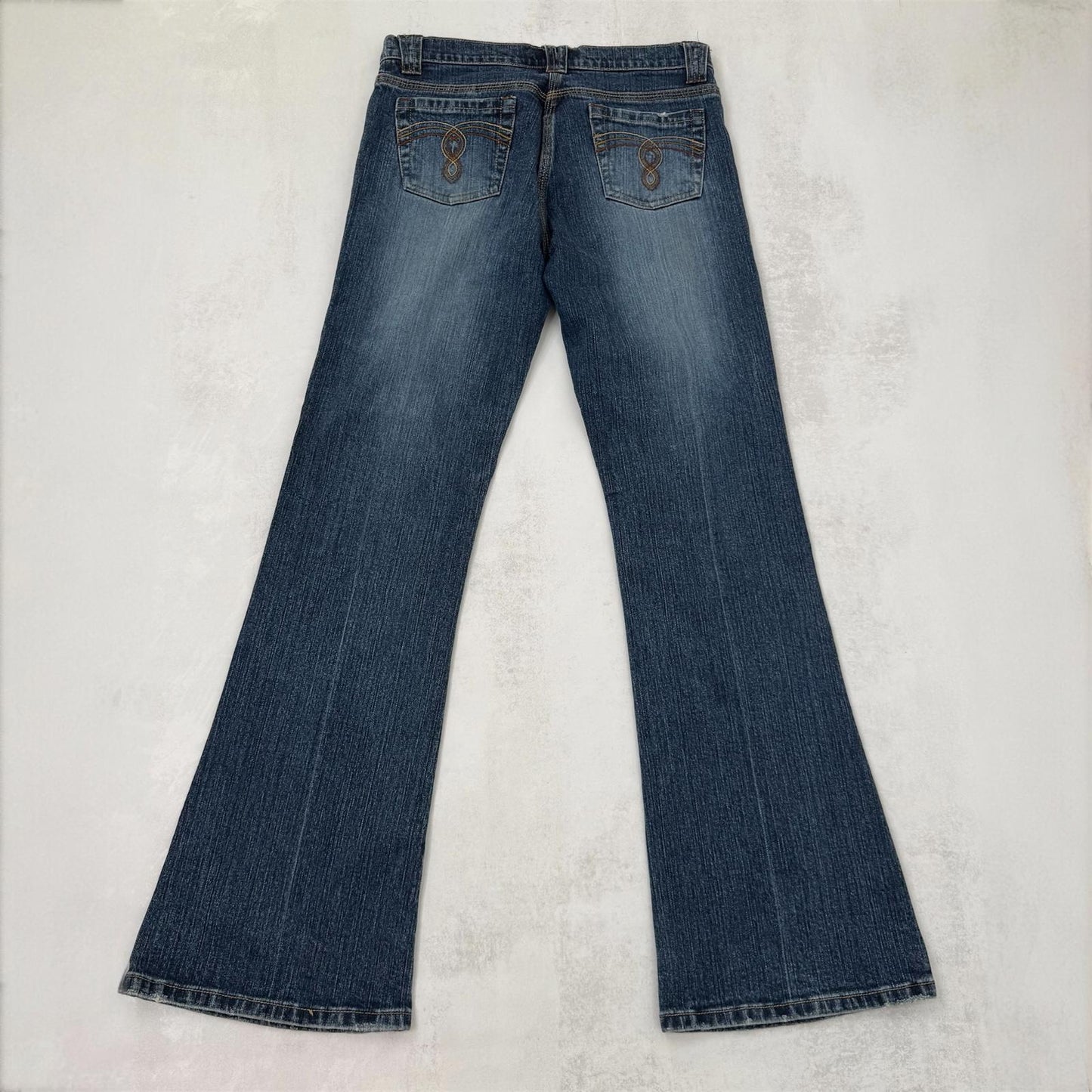 Y2K vintage bootcut denim jeans mid rise stretchy faded mid blue wash