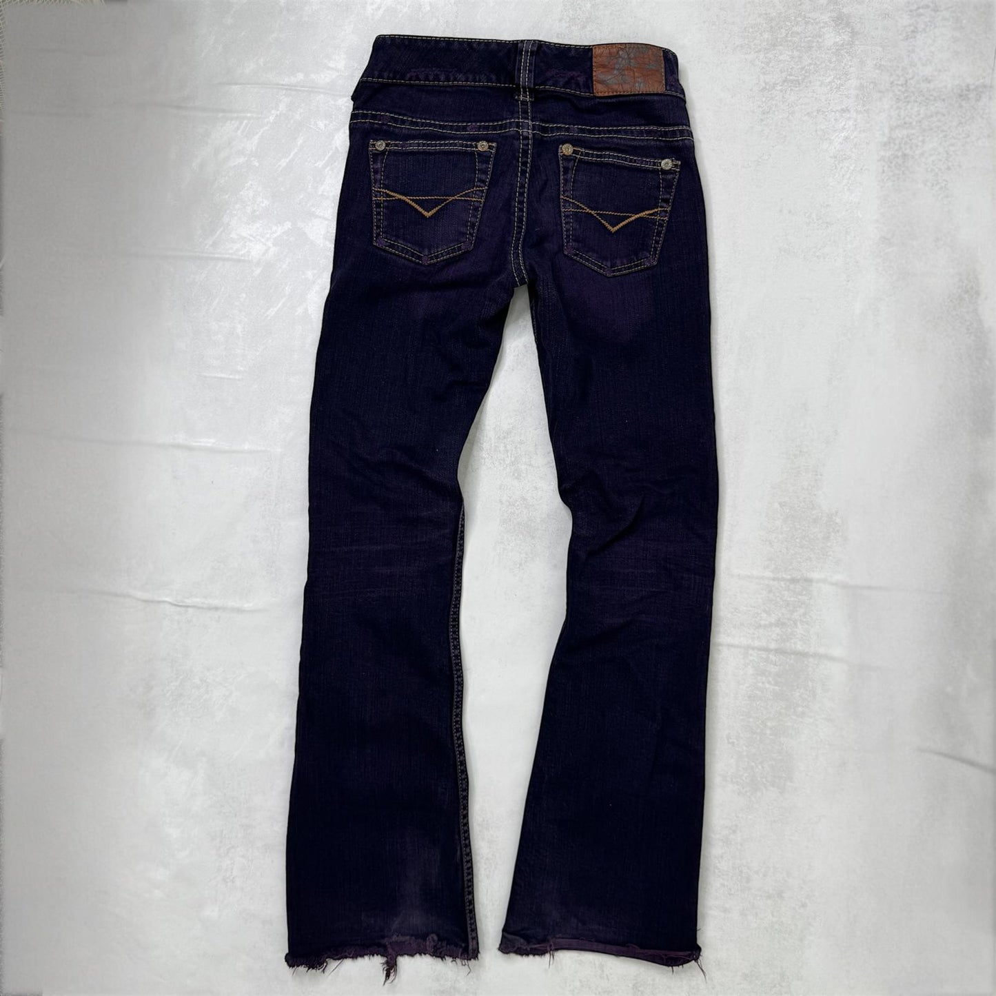 Y2K vintage low rise bootcut denim jeans stretchy purple faded wash fraying hem