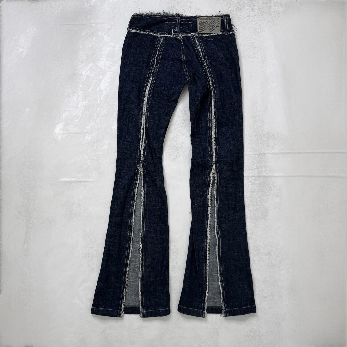 Y2K vintage low rise bootcut denim jeans zippers fraying hem dark blue wash