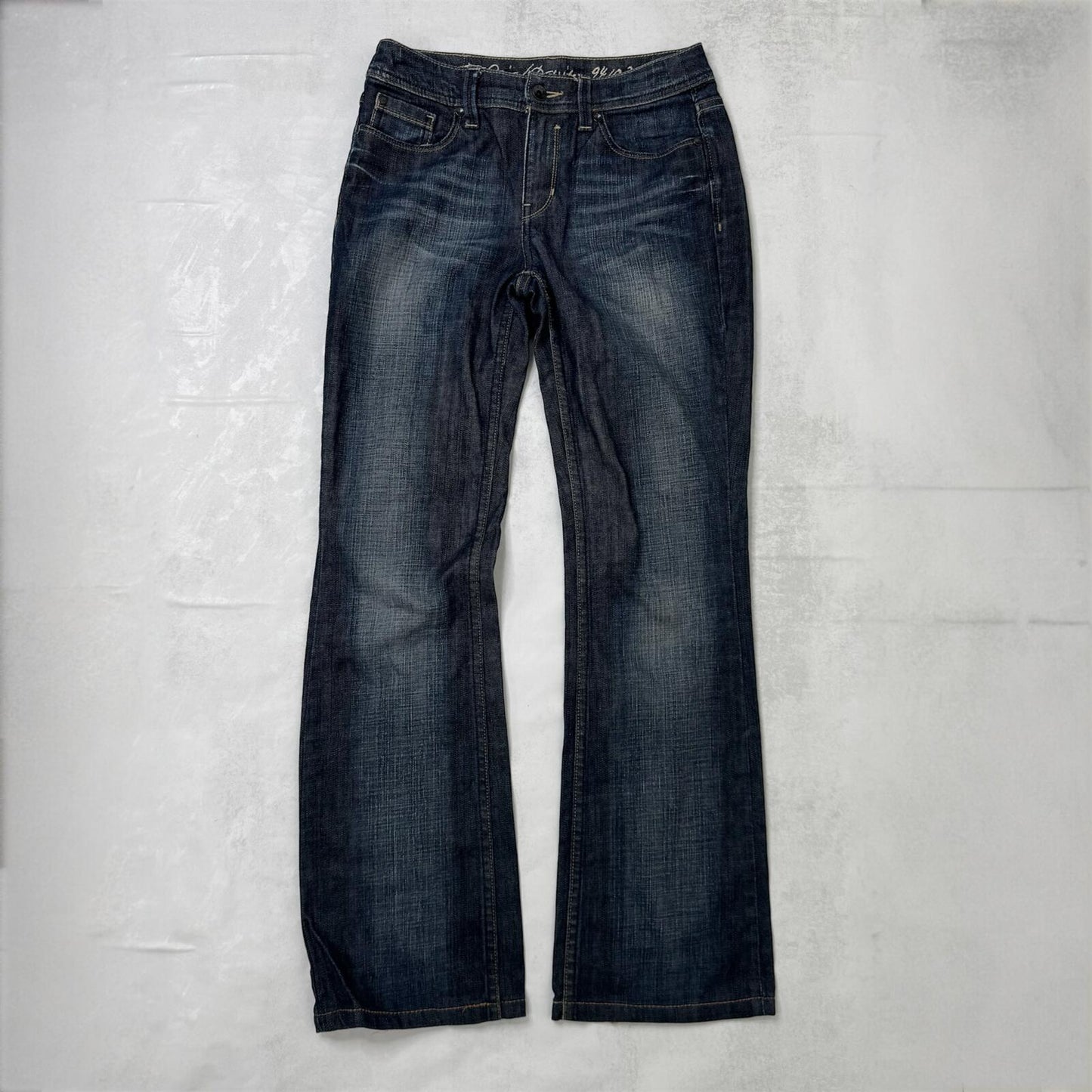 Y2K vintage bootcut denim jeans dark blue wash faded stretch mid rise