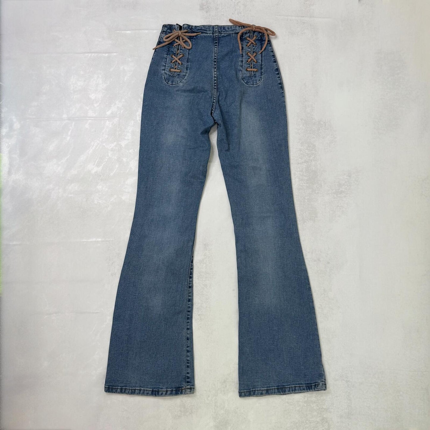 Y2K vintage bootcut denim jeans faded mid rise stretchy lace up mid blue wash