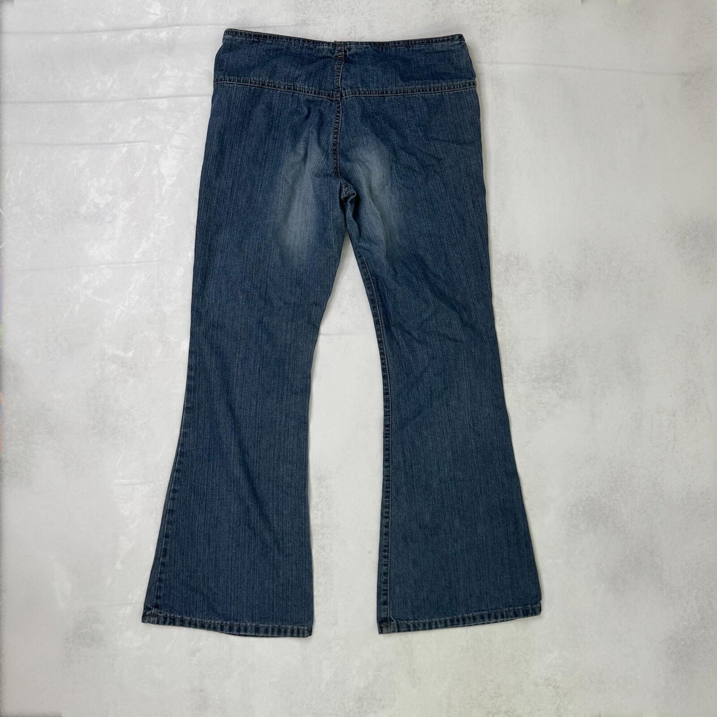 Y2K vintage bootcut denim jeans buckle belt faded blue wash ripped distressed