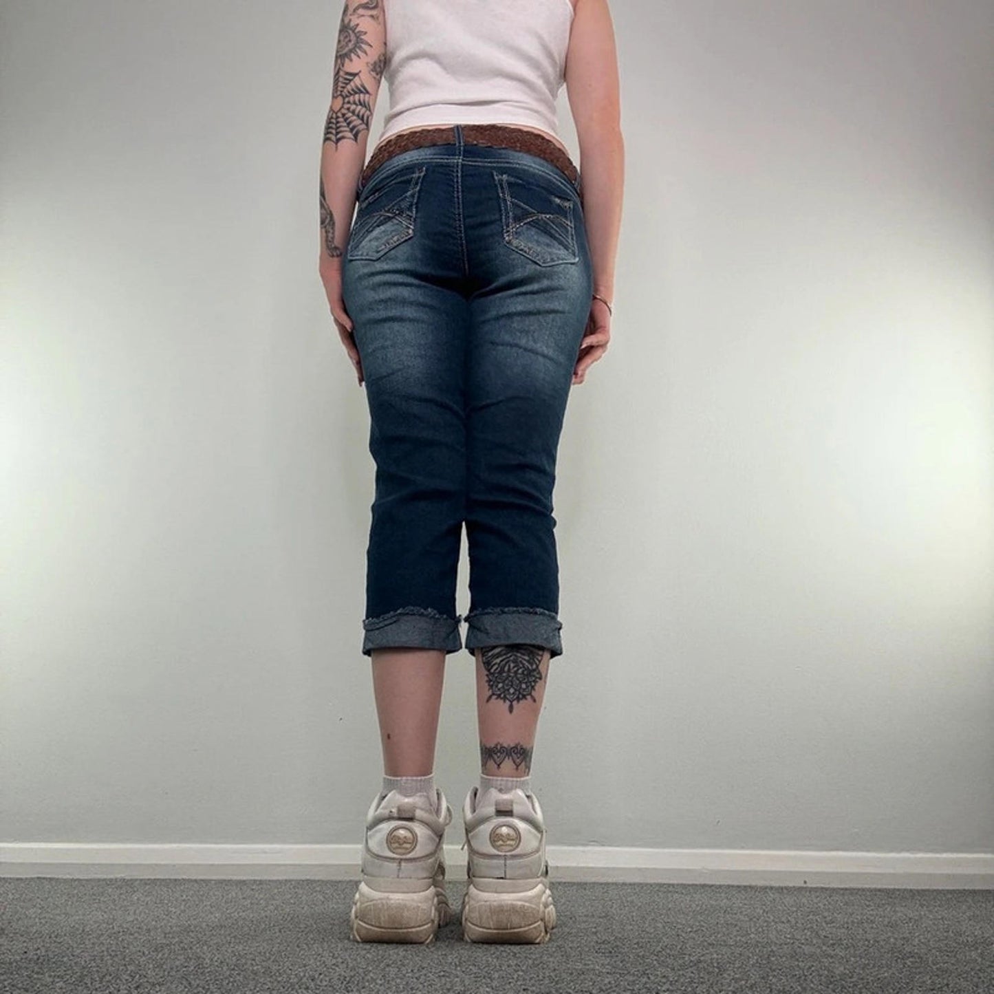 Y2K vintage mid rise stretch denim capri jeans with woven belt cropped faded