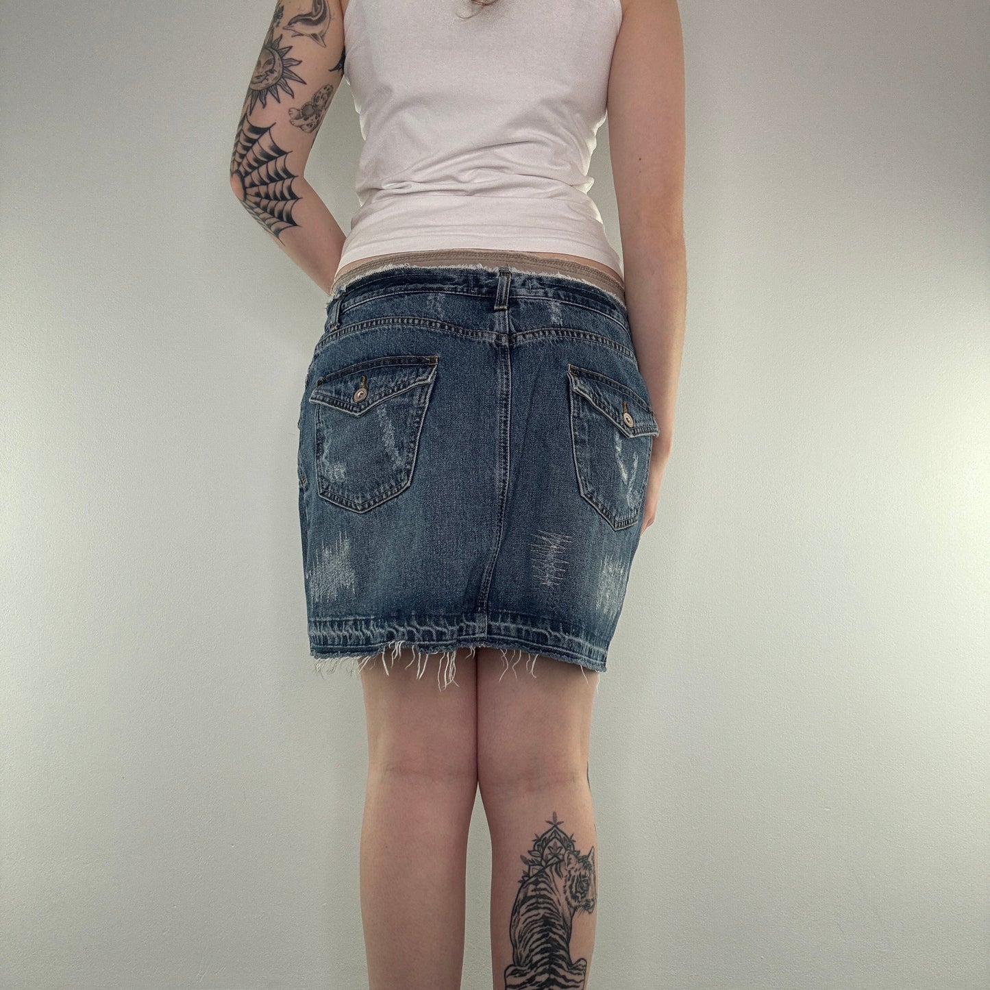 Y2K distressed fraying hem cargo denim mini skirt