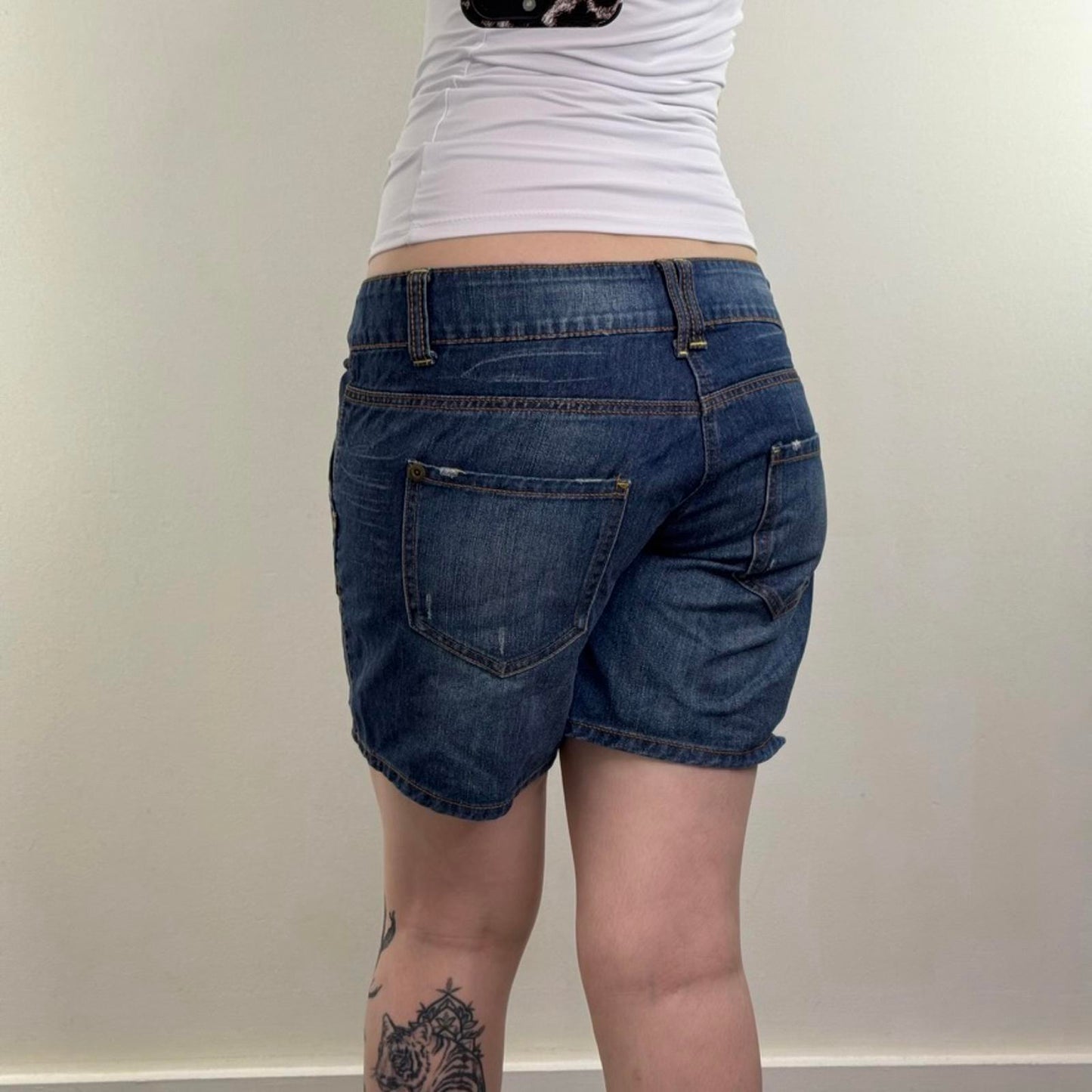 Y2K vintage low rise denim shorts jorts faded blue wash distressed baggy