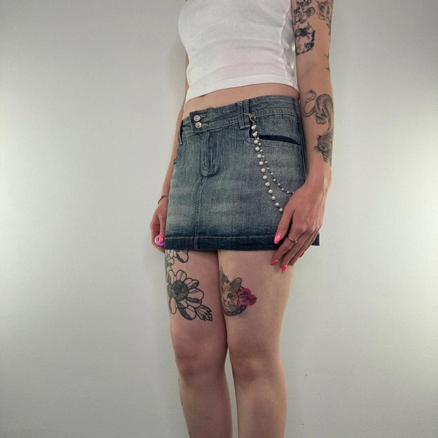 Y2K vintage faded denim mini skirt with faux pearl bead chain low rise