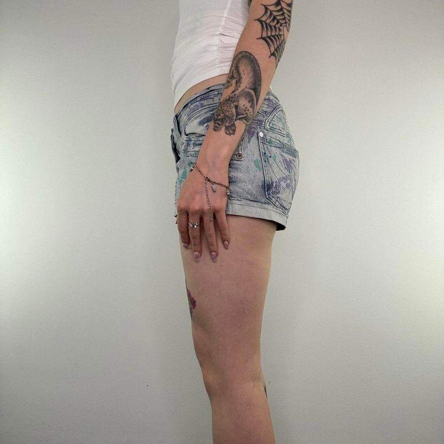 Y2K vintage low rise mini denim shorts paint splattered rhinestone embellished