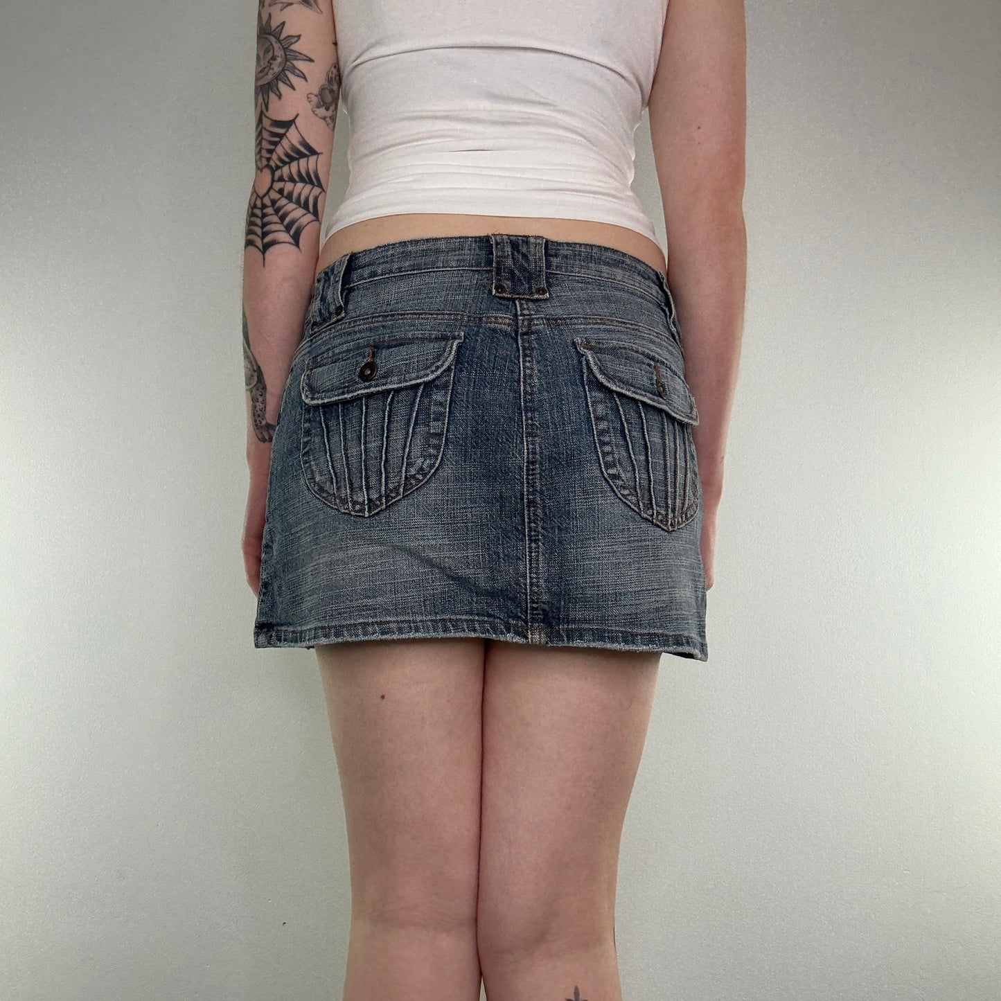 Y2K faded denim pocket mini skirt