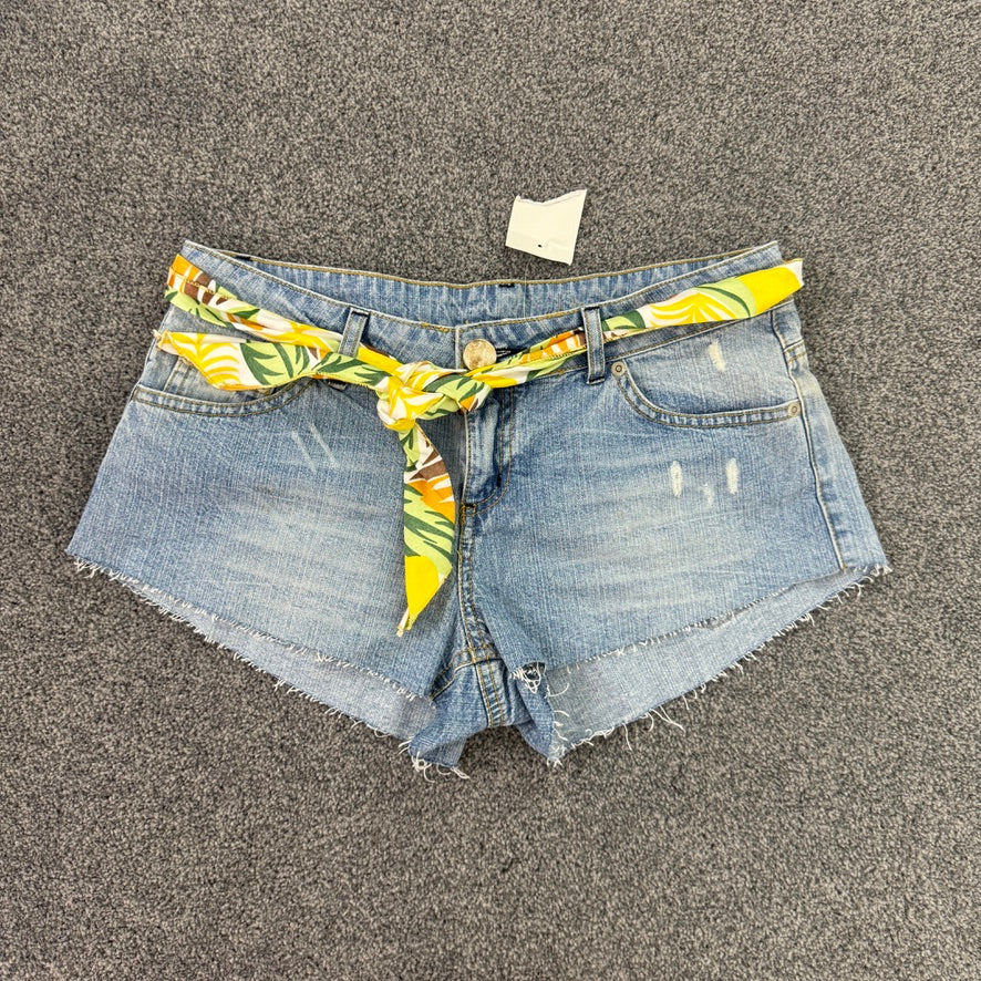 Y2K low rise raw hem mini denim shorts with sunflower tie belt