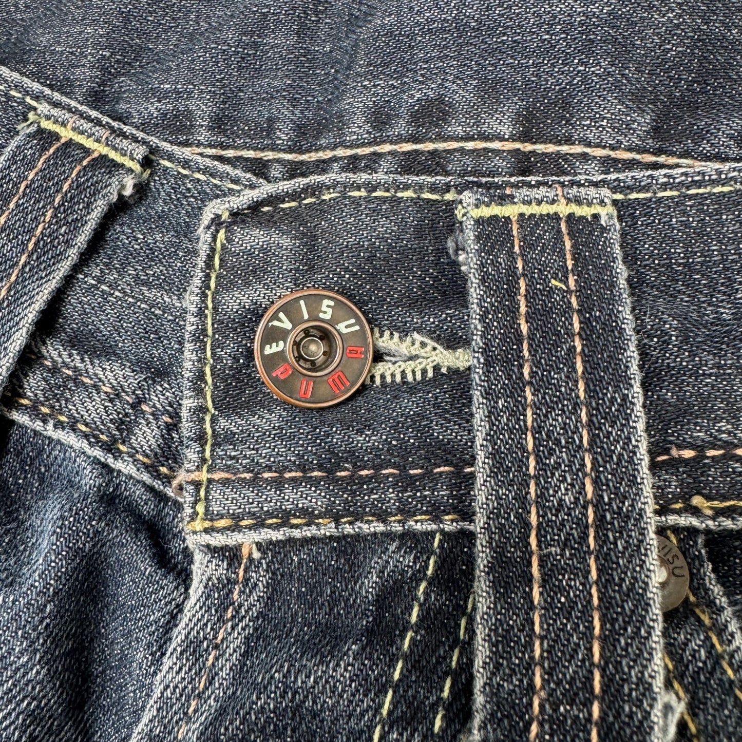 Y2K vintage Evisu x Puma bootcut jeans dark faded denim wash distressed