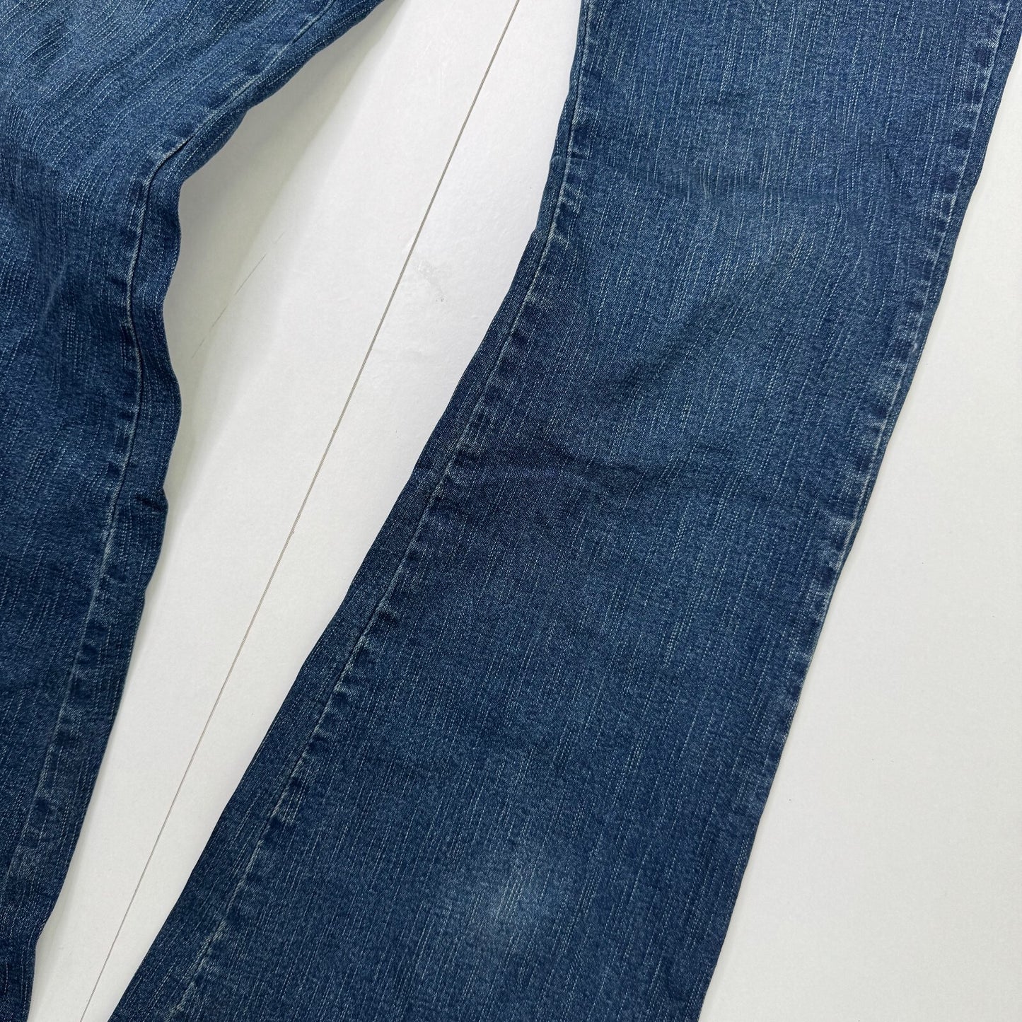 Y2K vintage bootcut denim jeans dark blue wash with chunky belt studs mid rise