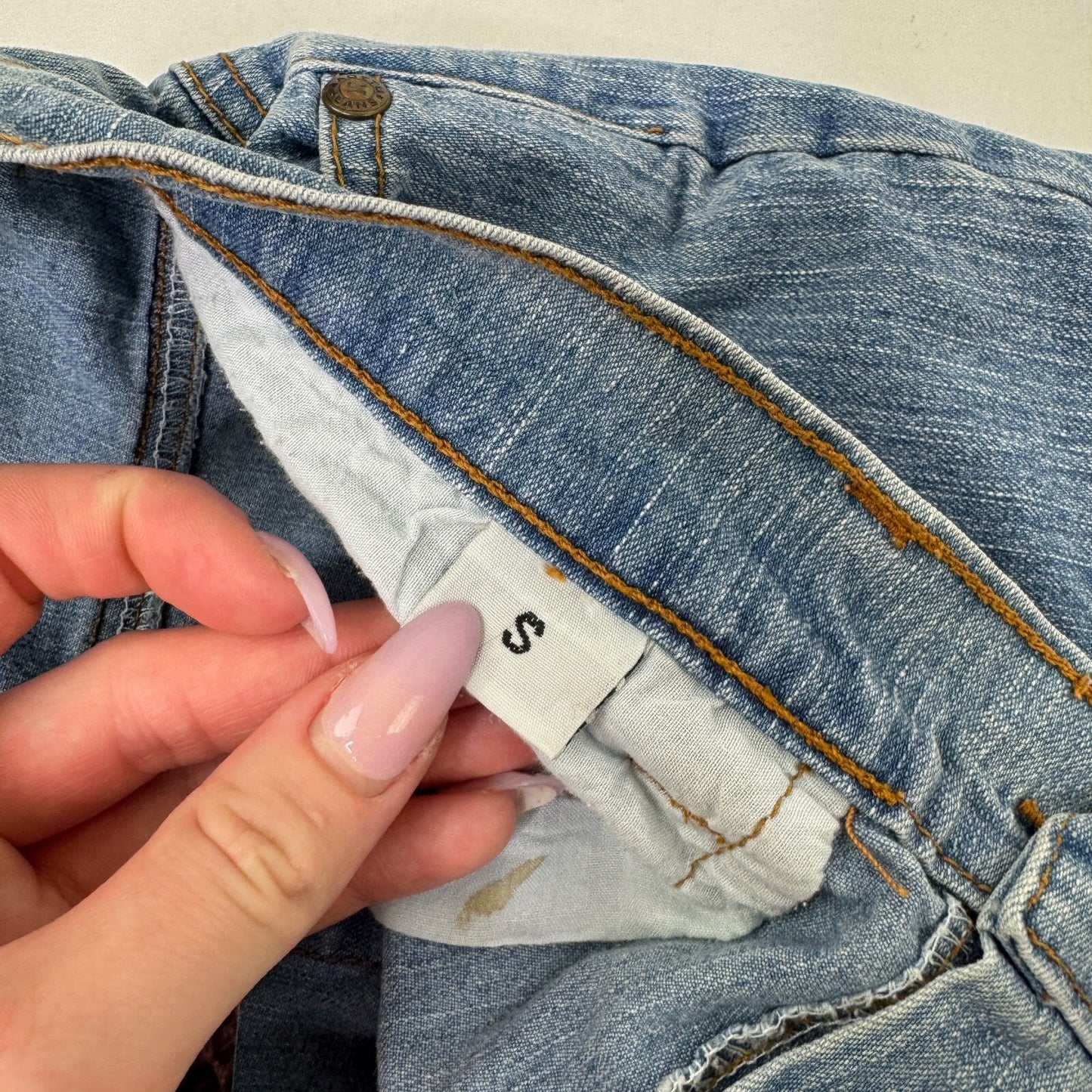 Y2K vintage bootcut denim jeans cut out beaded floral pattern light blue wash