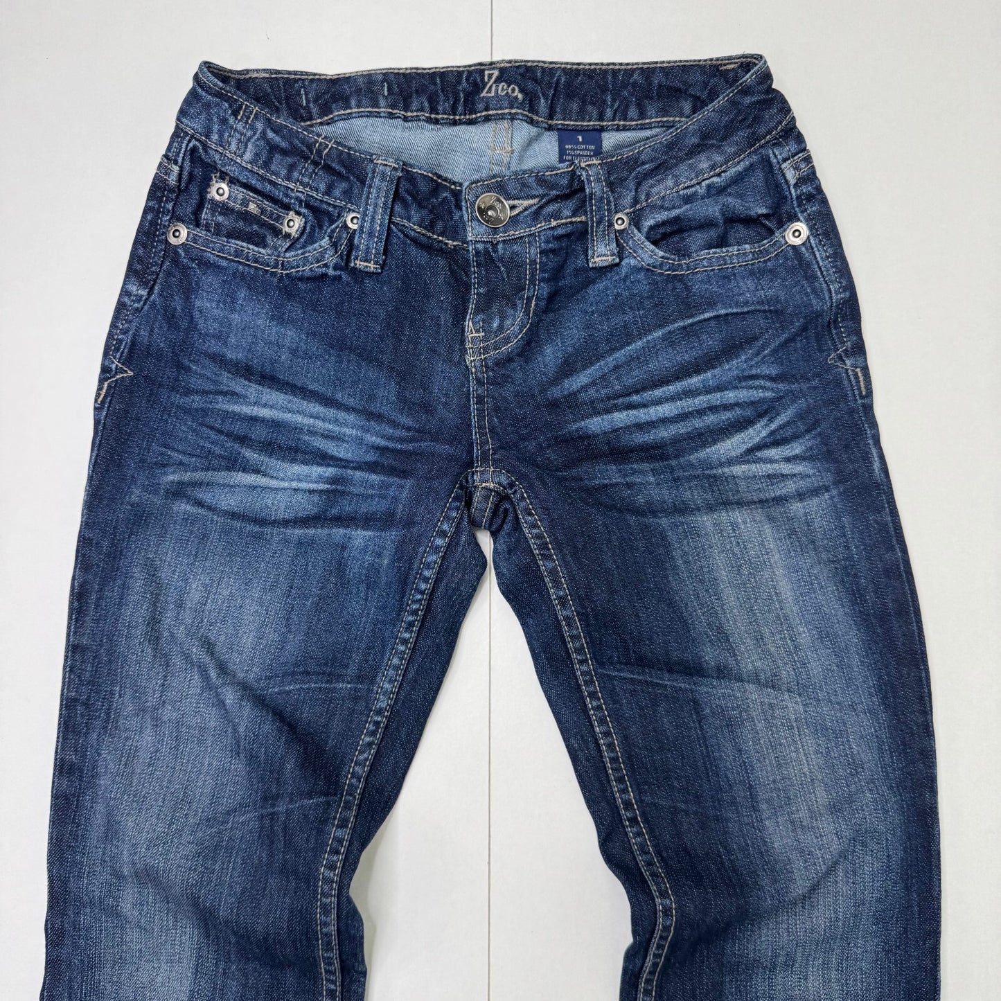 Y2K vintage low rise bootcut denim jeans dark blue wash stretchy faded