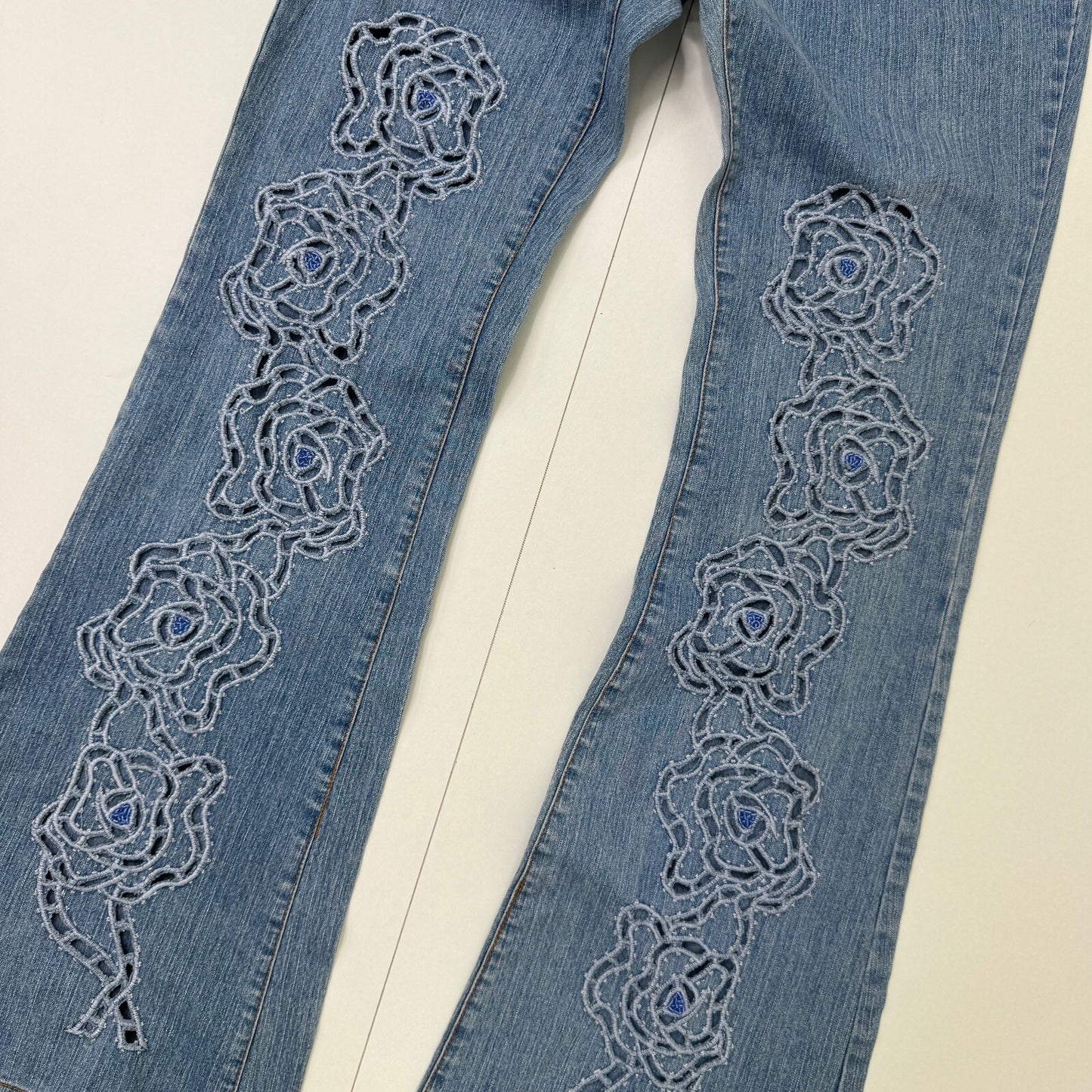 Y2K vintage bootcut denim jeans cut out beaded floral pattern light blue wash