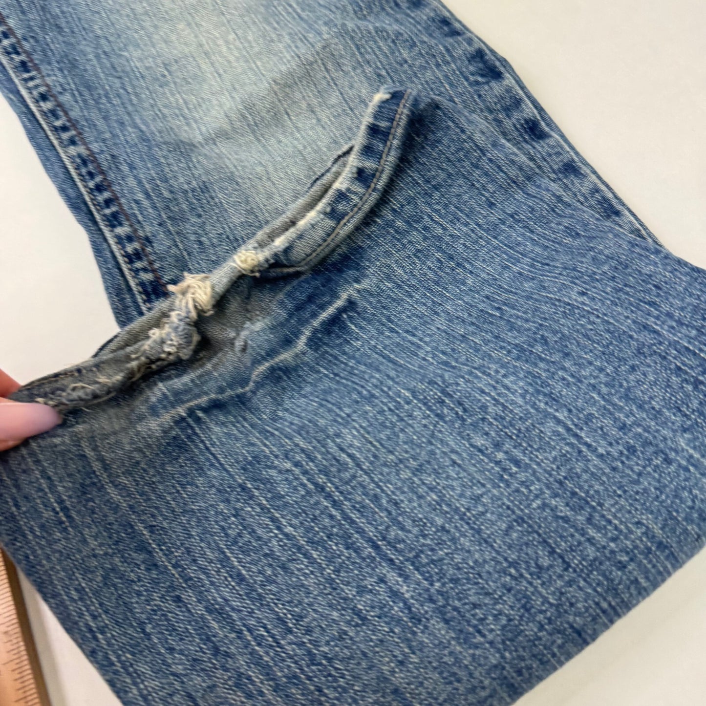 Y2K vintage bootcut denim jeans stretchy faded mid blue distressed