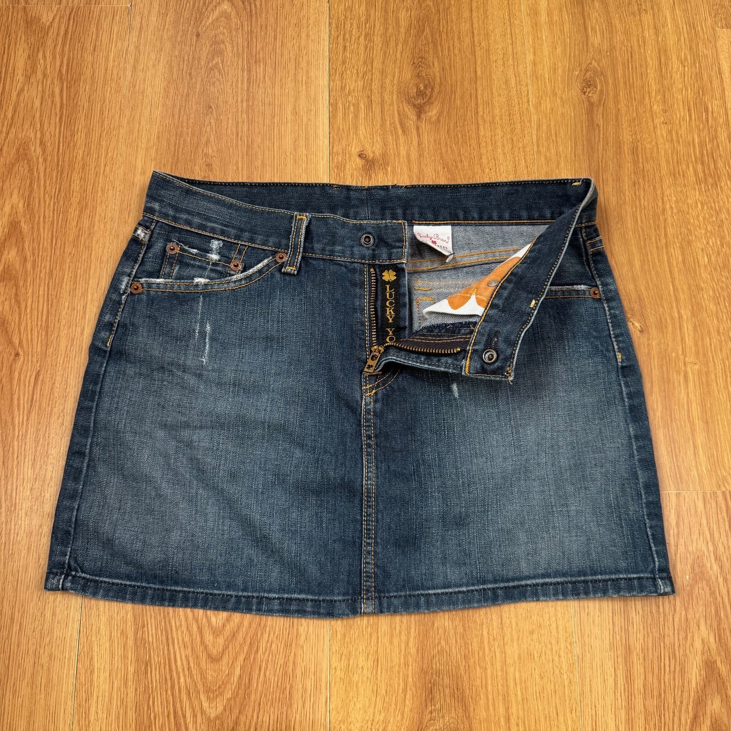 Y2K vintage mini skirt dark blue faded denim wash luck you distressed pockets