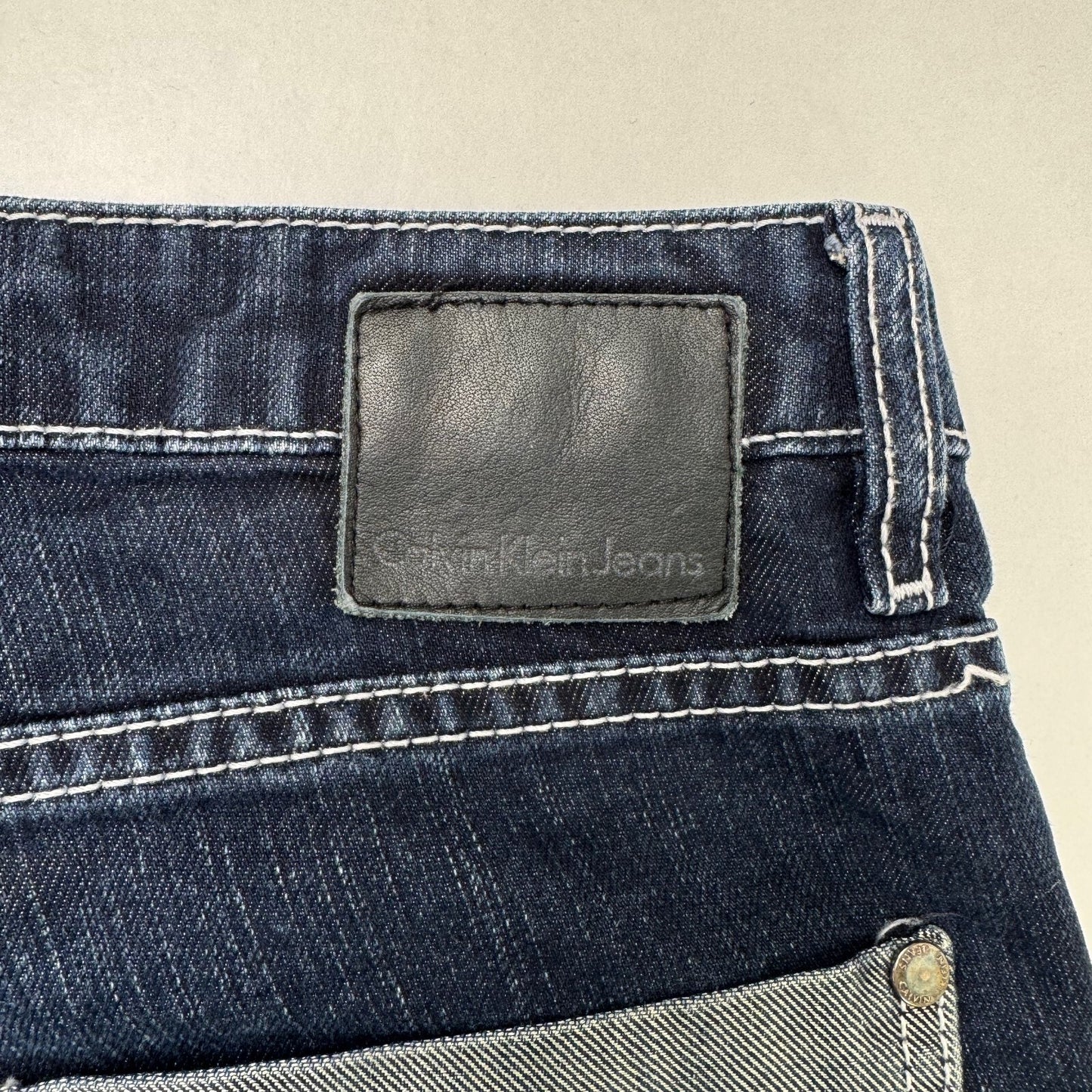 Y2K vintage Calvin Klein Jeans capri denim cropped dark blue wash stretchy zips
