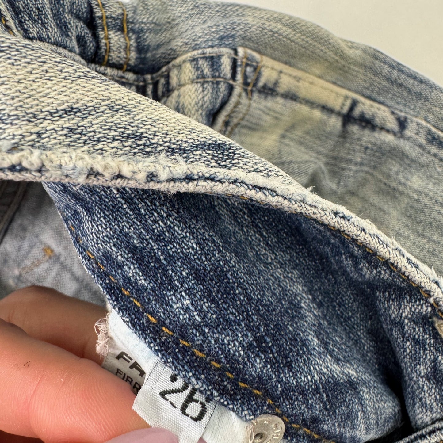 Y2K vintage low rise bootcut denim jeans faded distressed stripe wash