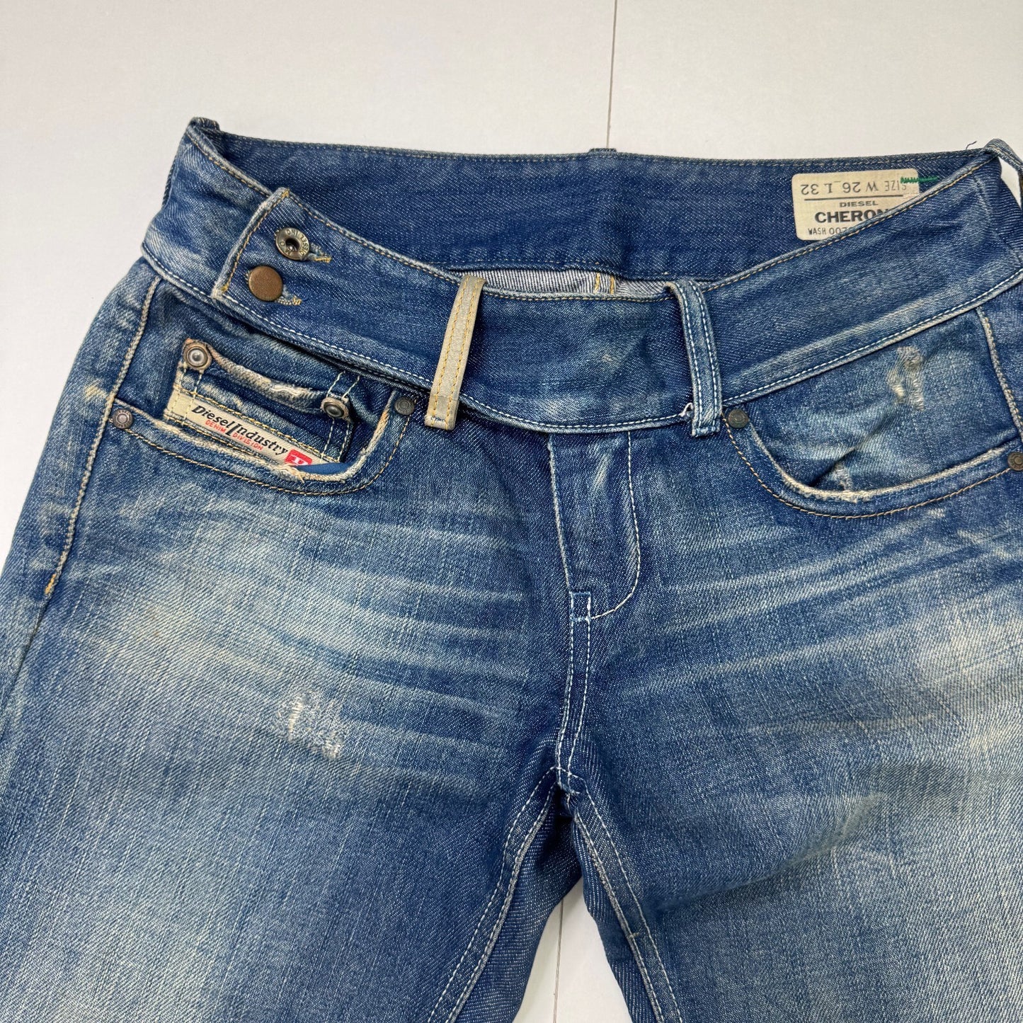 Y2K vintage Diesel bootcut denim jeans low rise faded blue wash belt buttons