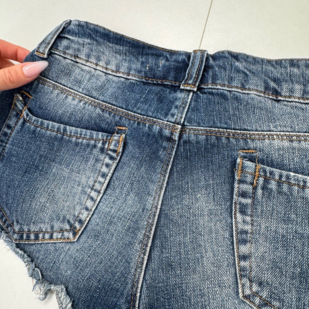 Vintage Y2K low rise denim mini shorts studded rhinestone dark faded wash