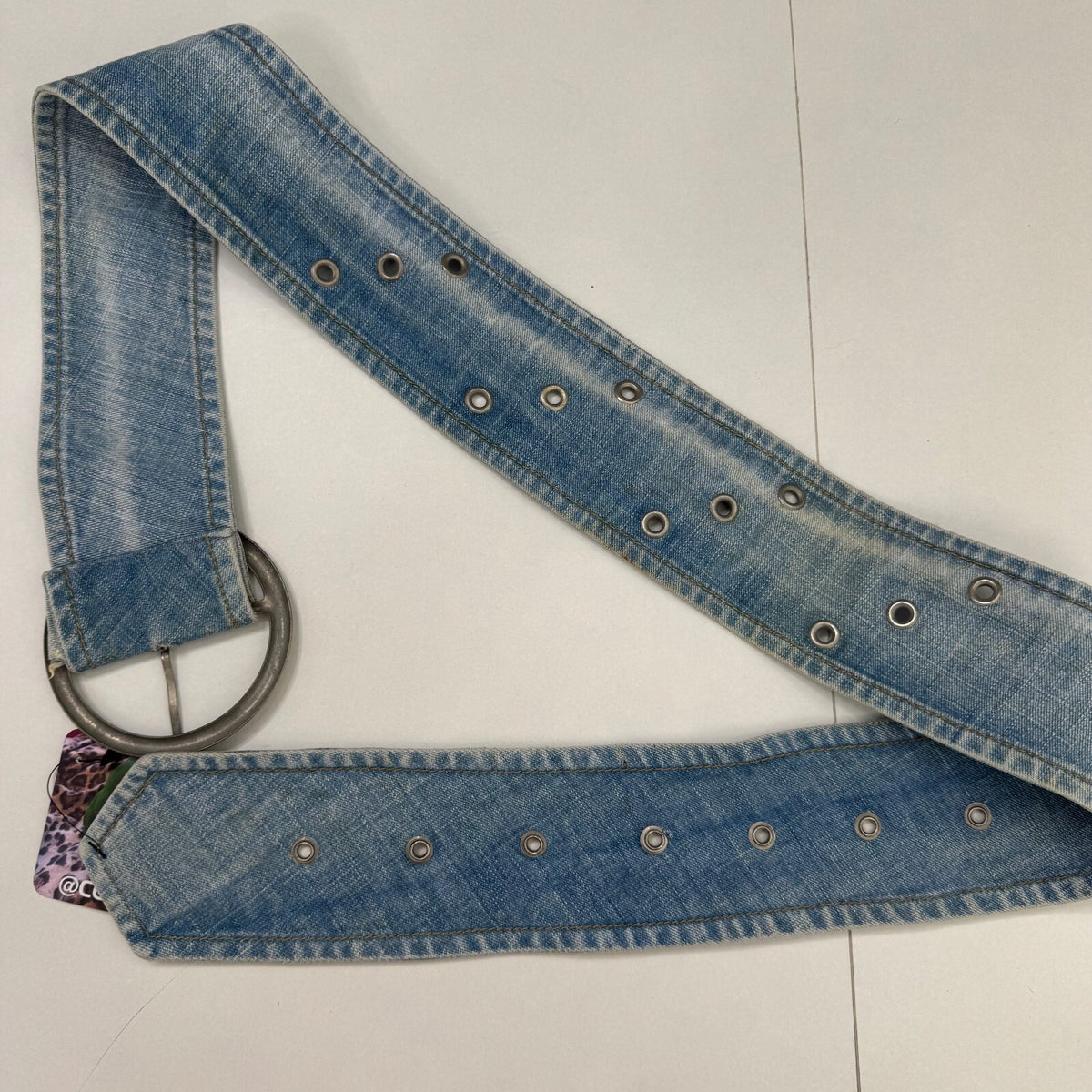 Y2K vintage belt denim chunky grommet light blue wash oversized circle