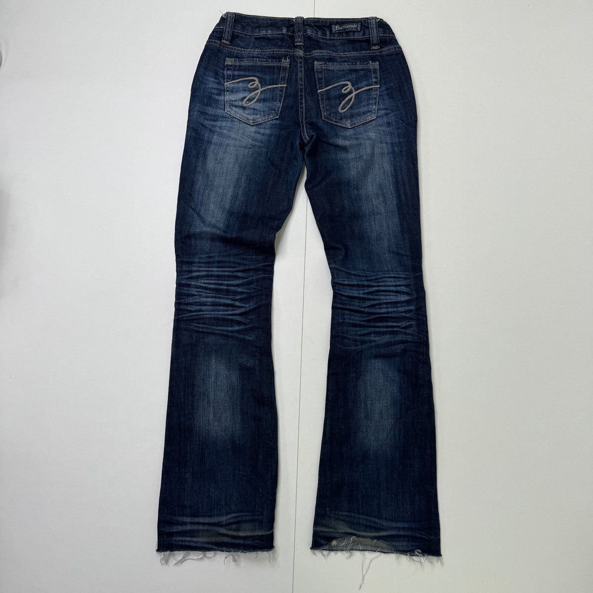 Y2K vintage super low rise bootcut denim jeans dark blue wash stretchy faded