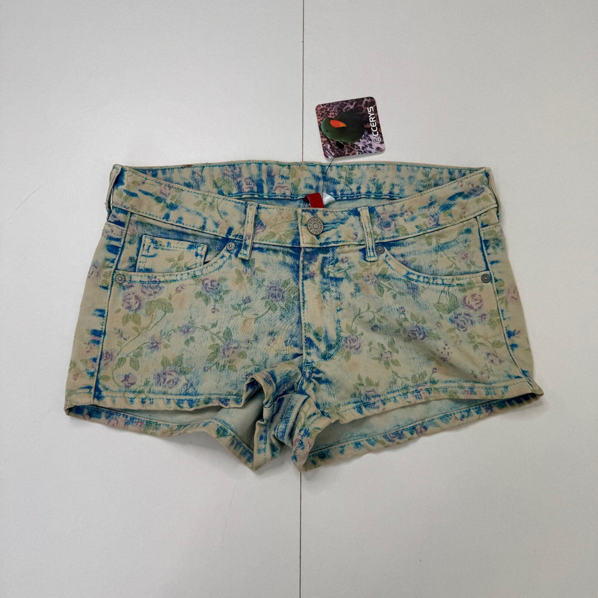 Vintage 2010s denim mini shorts low rise floral faded pattern boho stretchy