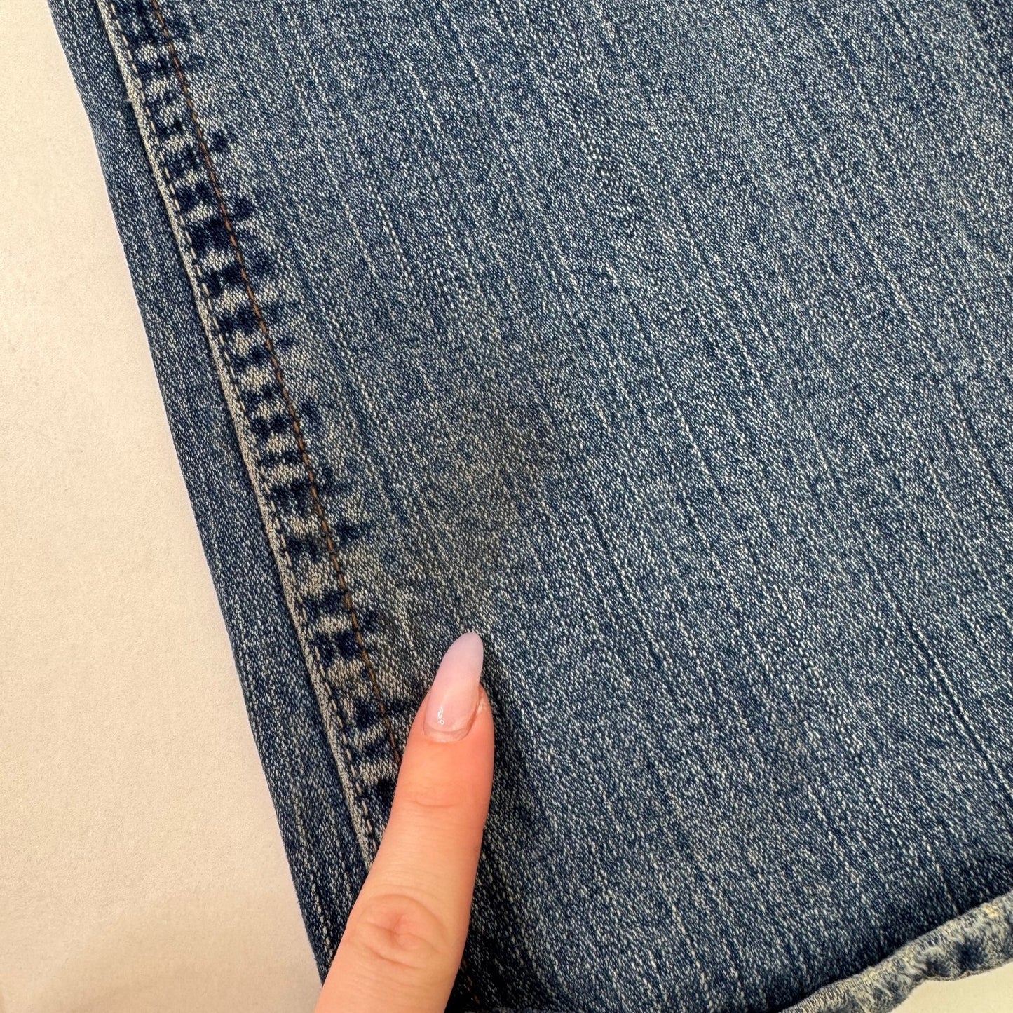 Y2K vintage bootcut denim jeans stretchy faded mid blue distressed